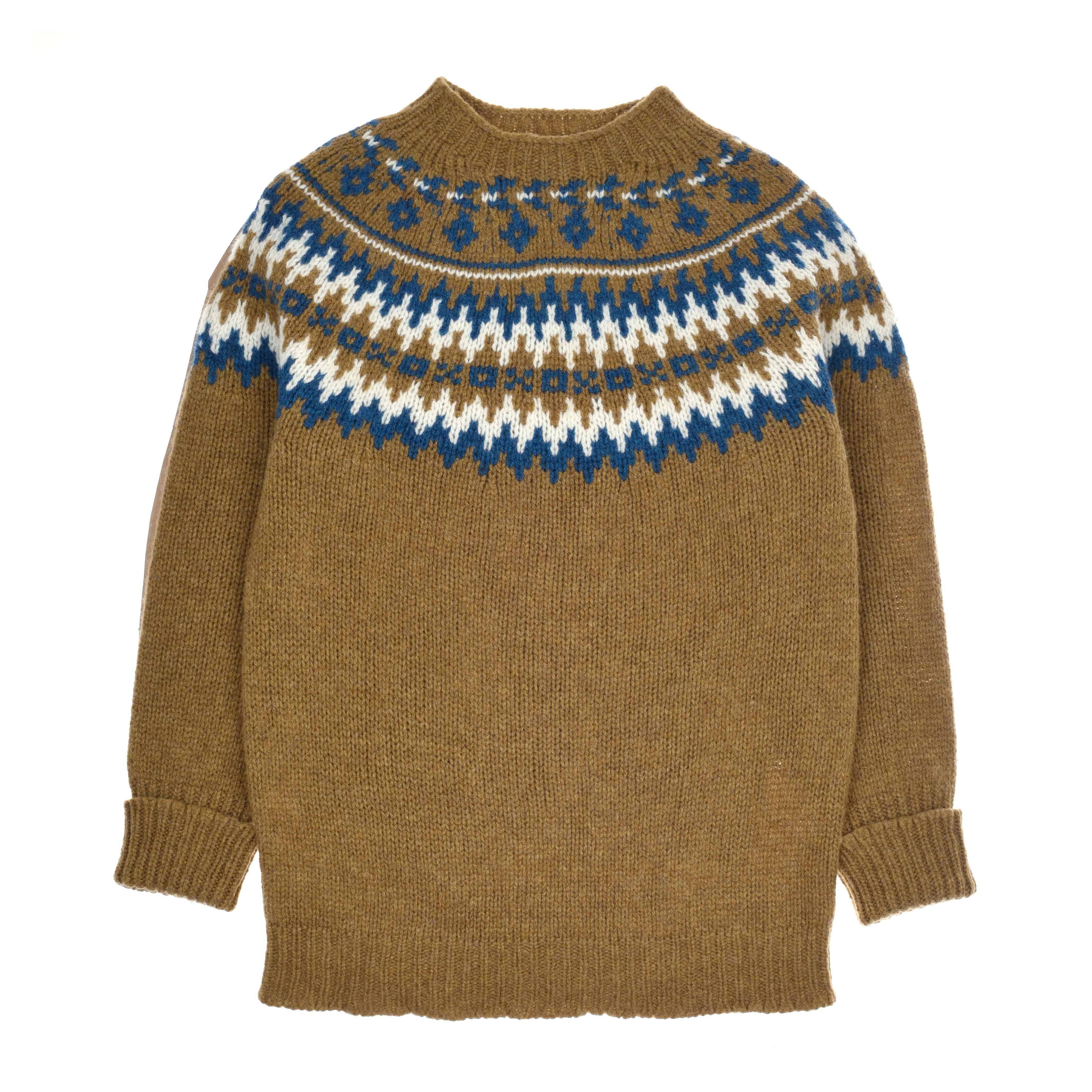 The Chunky Fairisle Jumper by Campbell's of Beauly in dark sage features blue, white, and dark brown geometric patterns on the yoke and shoulders, a round neckline, long sleeves, and ribbed cuffs for a cozy winter feel.