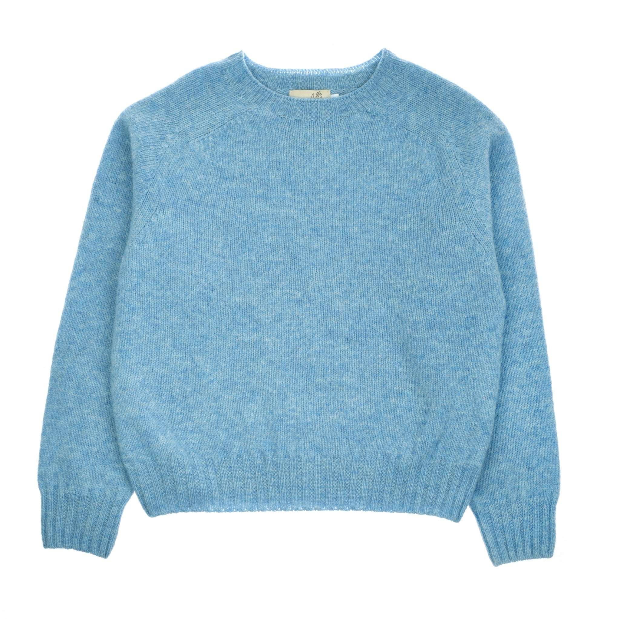 The Cropped Shetland Jumper by Campbells of Beauly in Arctic, a light blue shade, features long sleeves and a crew neckline, crafted from soft Shetland lambswool yarns and shown laid flat on a white background.