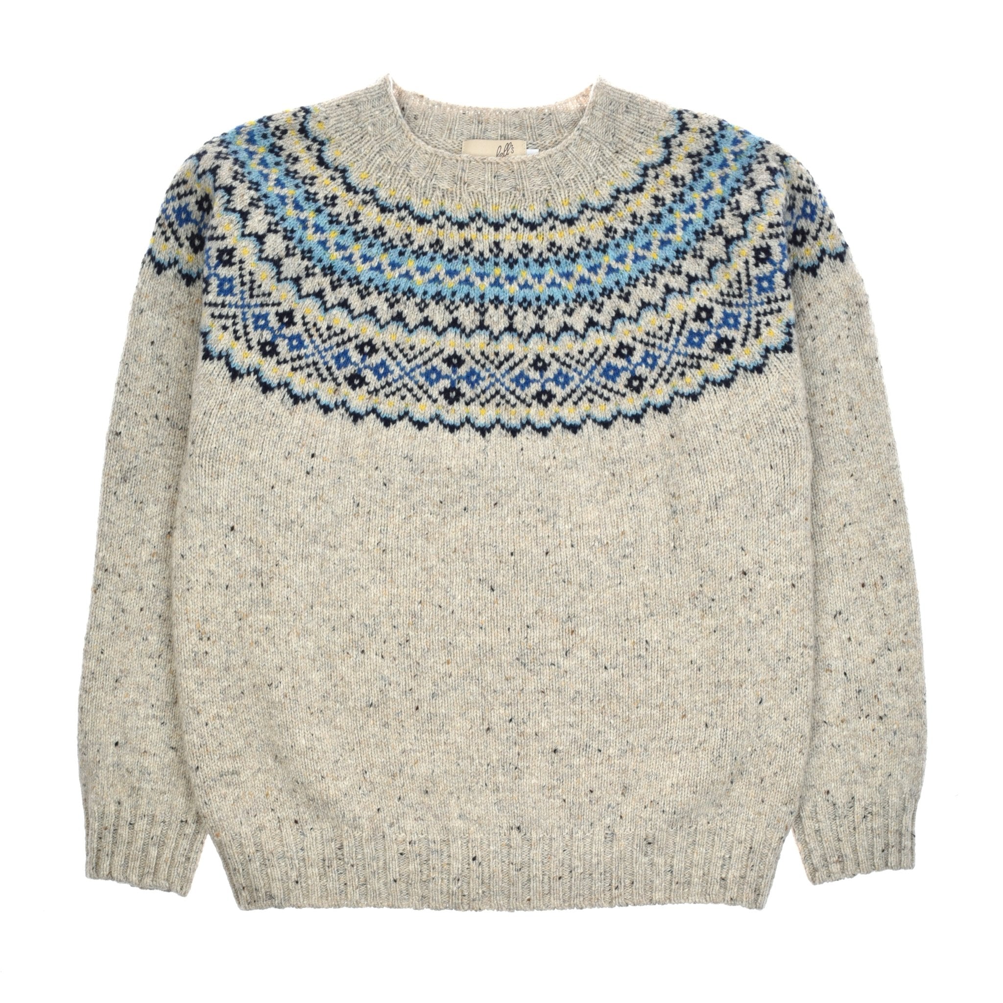 The Donegal Lambswool Fairisle Crew by Campbells of Beauly is a blue pure wool sweater, featuring a round neck, classic Fair Isle pattern in blue and navy across the chest and cuffs, with subtle speckled dark flecks throughout.