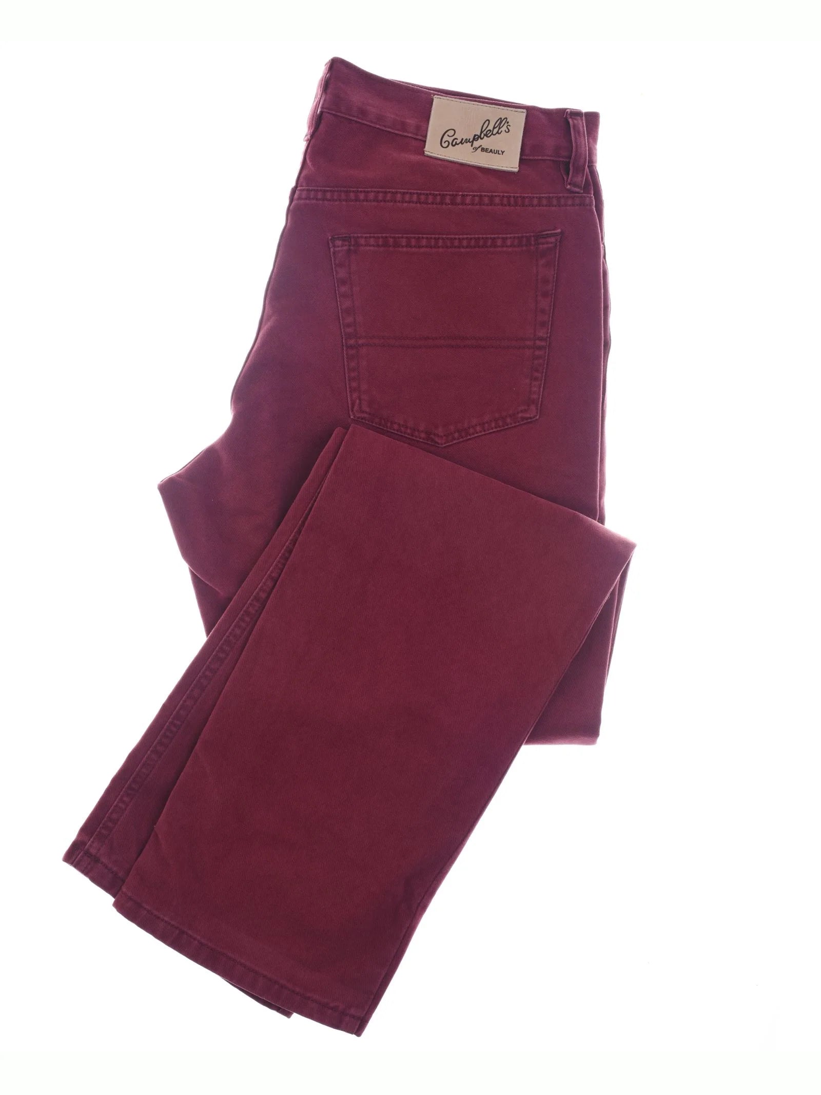 A pair of Campbell's of Beauly Colour Cotton Jeans in Mulberry, straight leg with a visible back pocket and beige waistband label, folded against a white background.