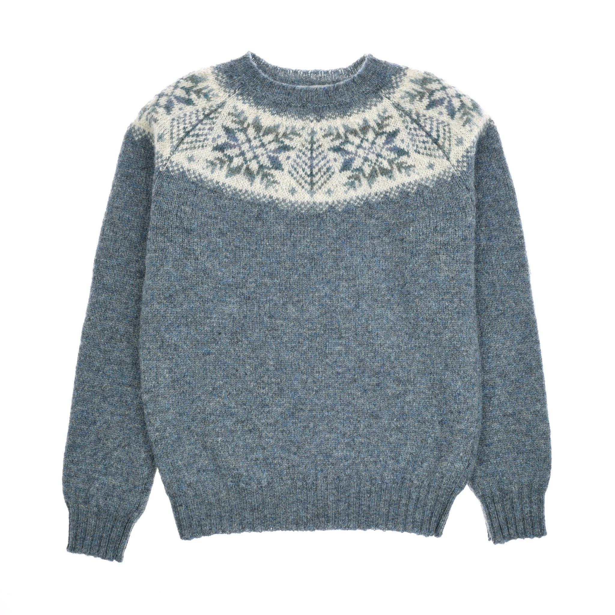 The Shetland Wool Snowflake Crew Jumper by Campbells of Beauly in Blue Lovat features a white and gray Nordic snowflake Fairisle yoke, long sleeves, and ribbed cuffs and hem for a cozy, classic finish.