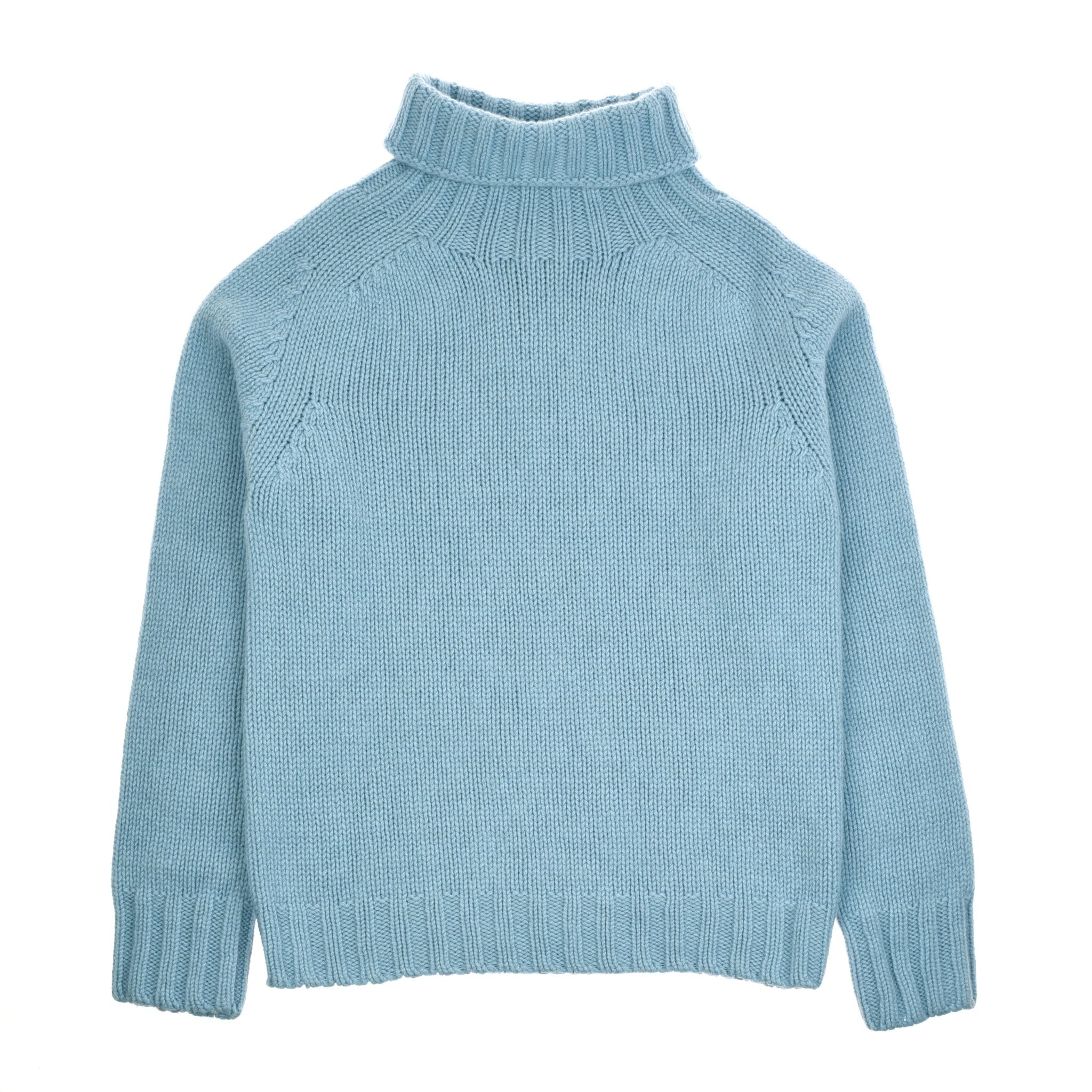 The Campbells of Beauly Chunky Roll Neck Sweater in periwinkle features a supersoft wool knit, chunky roll neck, long sleeves, and ribbed cuffs, hem, and collar, shown laid flat on a white background.