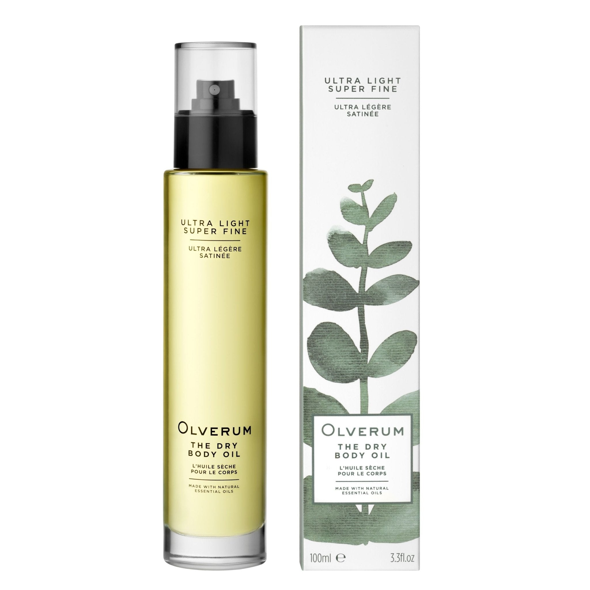 A 100ml (3.3 fl oz) bottle of Olverum Dry Body Oil with a pump dispenser stands beside its box, which displays green leaf botanical art. This dry oil nourishes hair and skin with botanical oils.