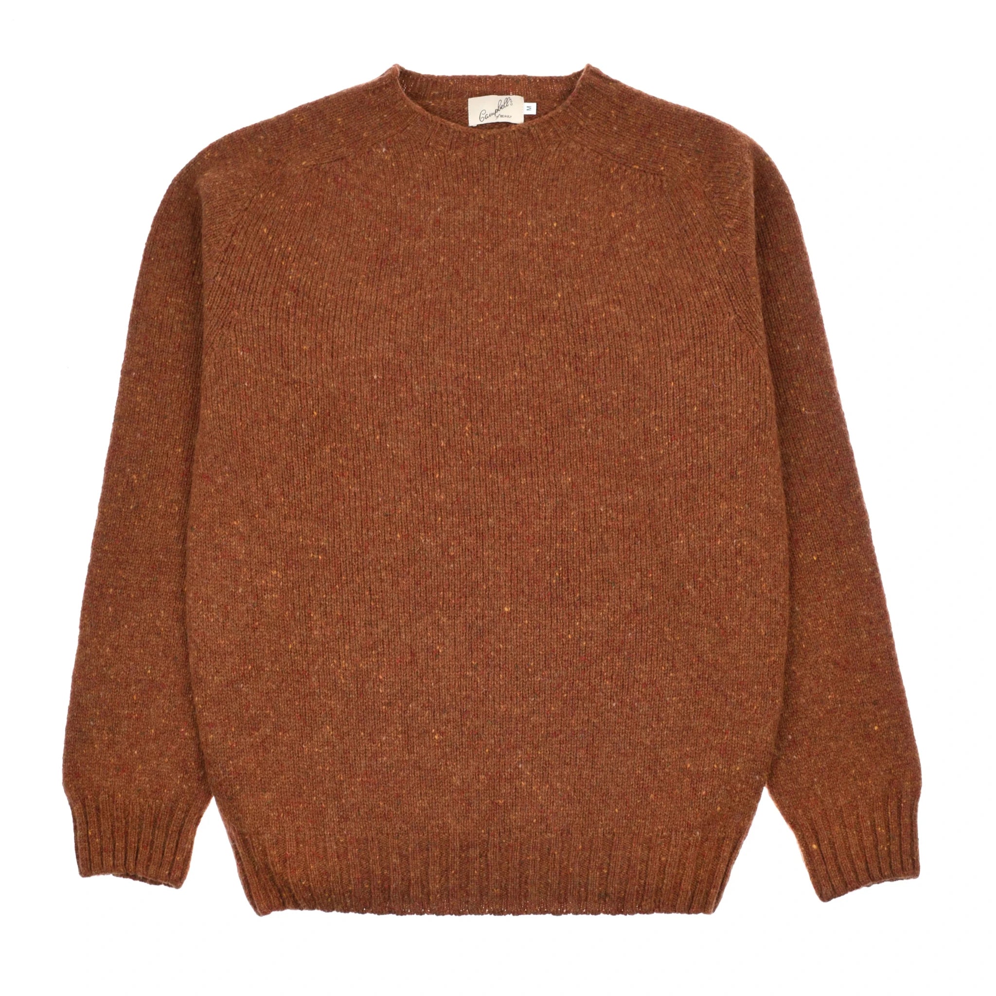 A Campbell's of Beauly Auld Stock Donegal Lambswool Crew Neck Jumper in rhum is laid flat on a white background, showcasing its flecked texture and ribbed cuffs, hem, and neckline.