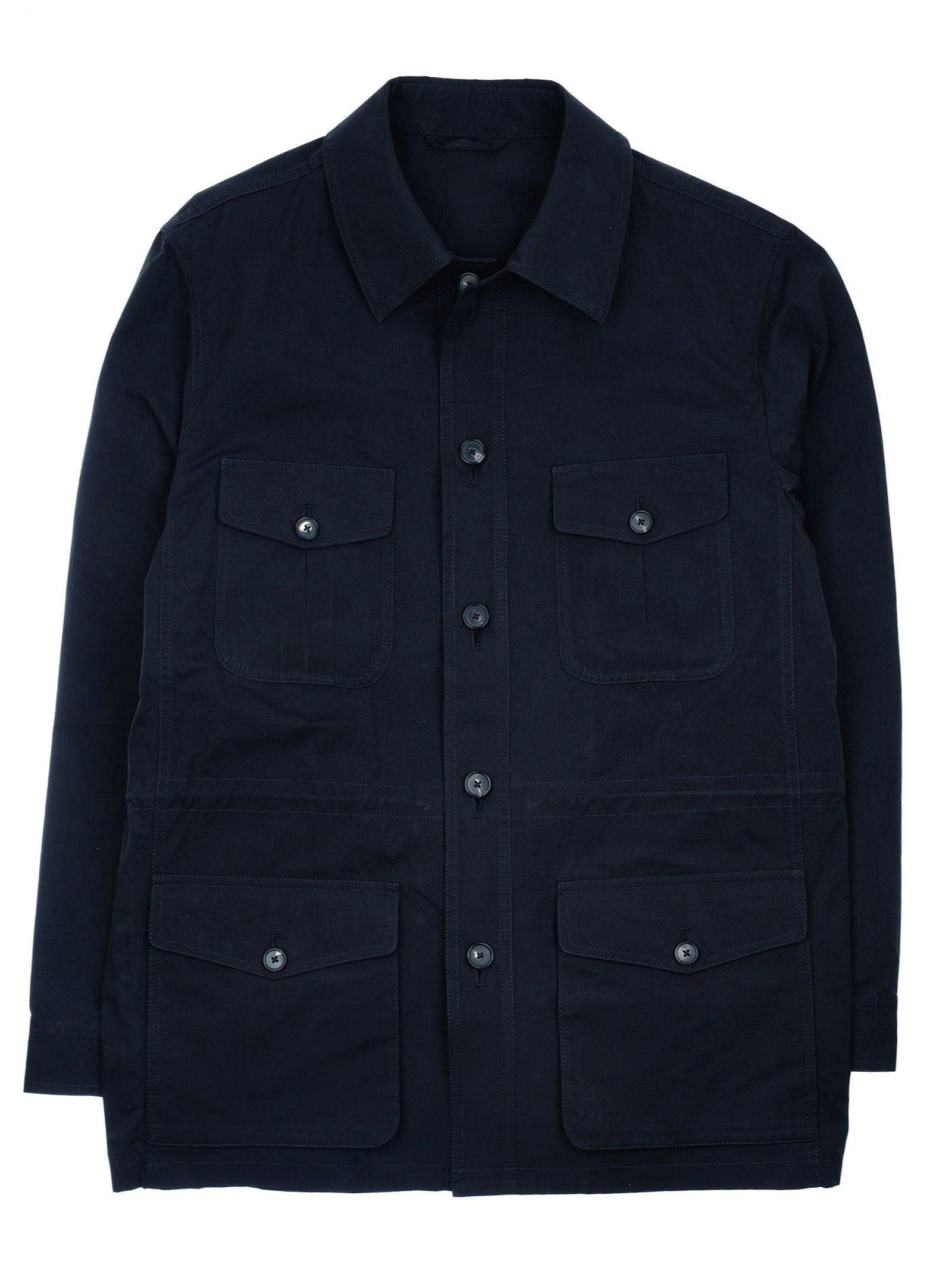 The Aigas Field Jacket by Campbell’s of Beauly is a black button-up field jacket featuring a collar and four front flap pockets—two on the chest and two at the waist—crafted from water-repellent peach skin fabric and shown against a white background.