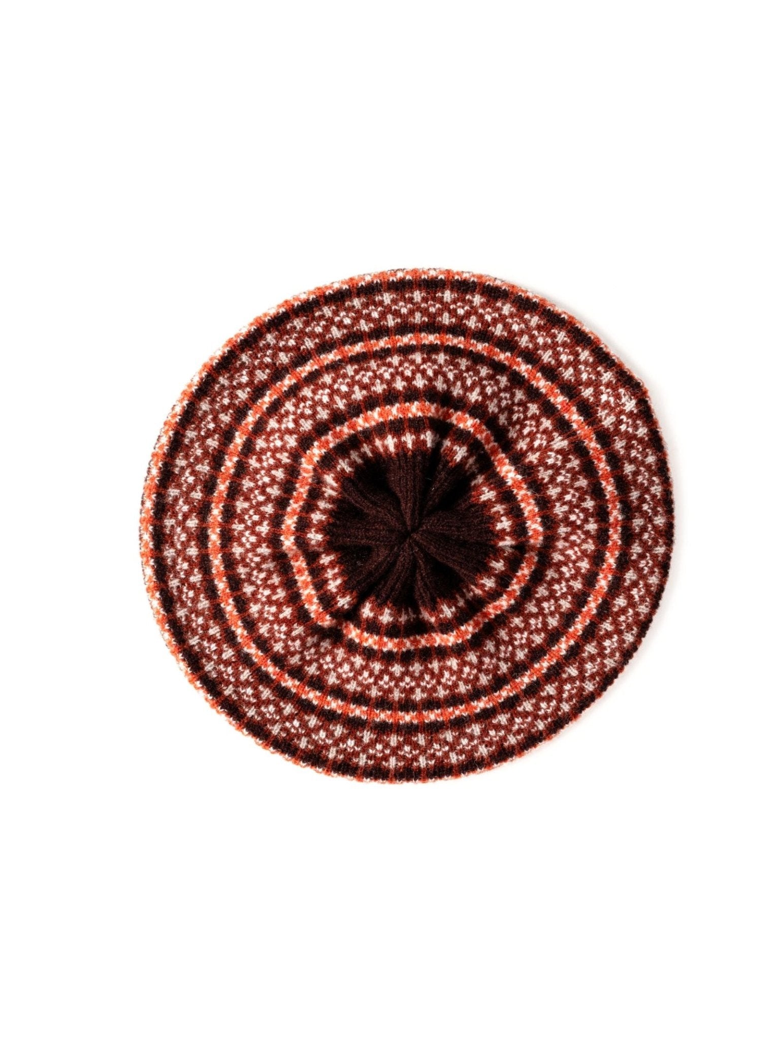 The Campbells of Beauly Fairisle Beret in Bordeaux features classic concentric circular patterns in brown, red, and white lambswool, shown from above on a white background.