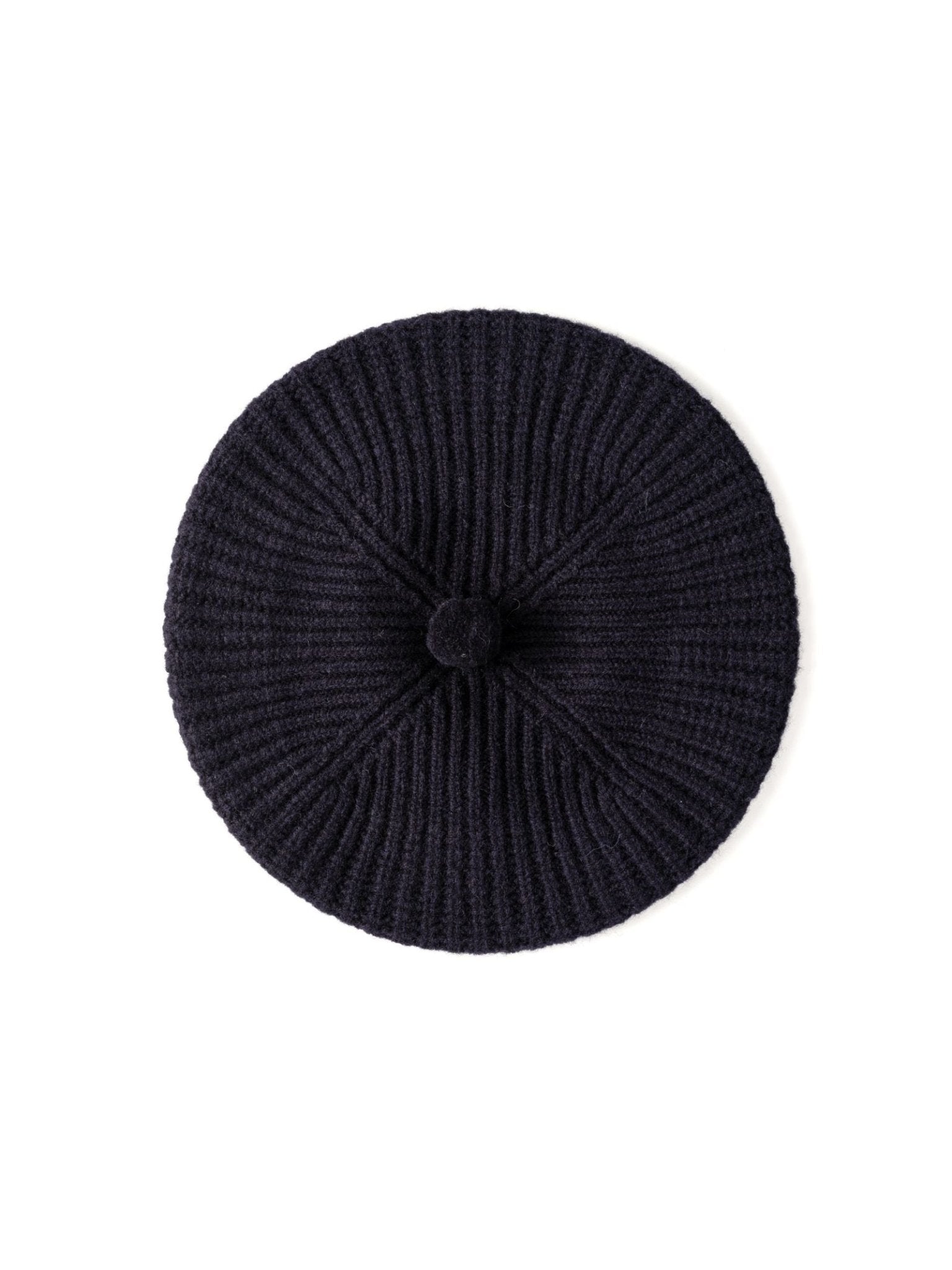 The Campbells of Beauly Rib Beret in navy, crafted from soft lambswool with ribbed texture and central button detail, is shown from above to highlight its classic circular shape—ideal for winter styling.