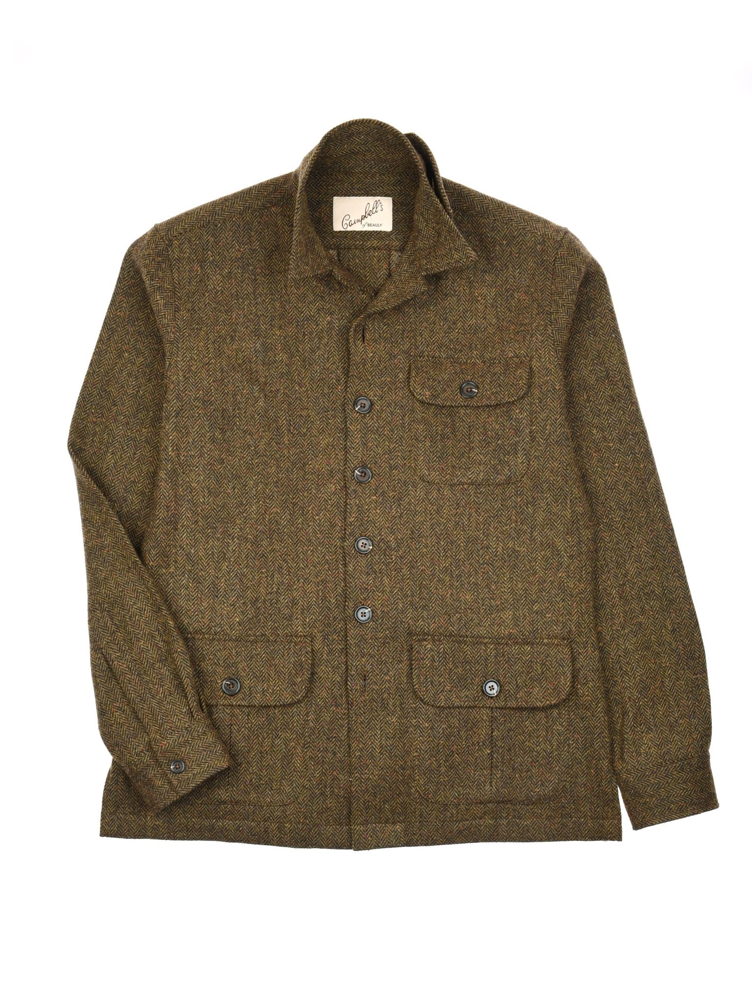 The Campbells of Beauly Casual Shacket is a brown British tweed wool jacket with a collar, button-up front, and four front pockets—three with button flaps, one open—plus traditional tailoring and an interior collar label.