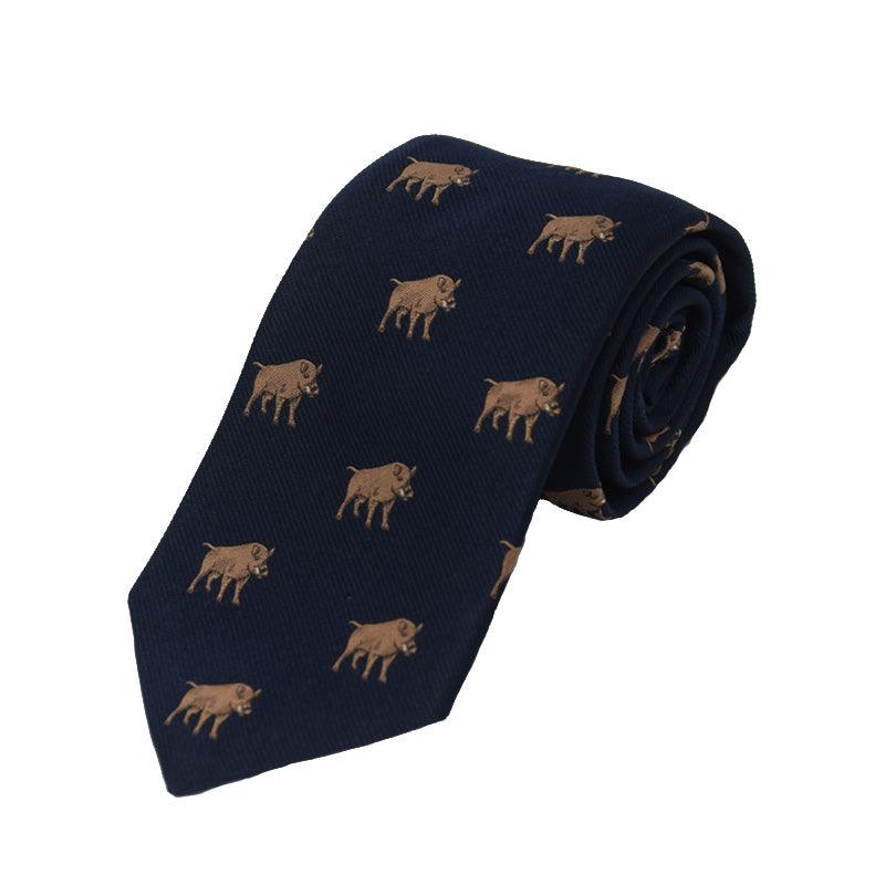 The Boar Silk Tie by Campbells of Beauly is a navy blue handmade silk tie with a repeating boar motif in light brown. Rolled to display its tip and length, it highlights its charming countryside-inspired design.