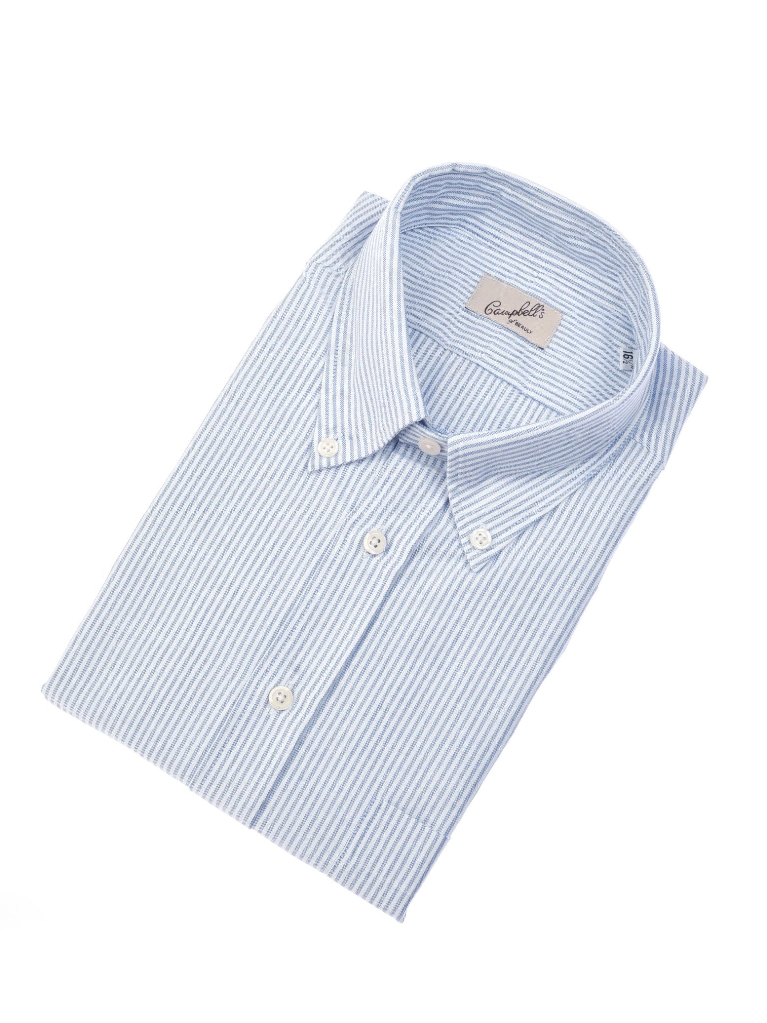 The Campbells of Beauly Oxford Shirt is a light blue and white striped button-up with a pointed collar and white buttons, neatly folded and displayed against a white background. The collar features an inside label.