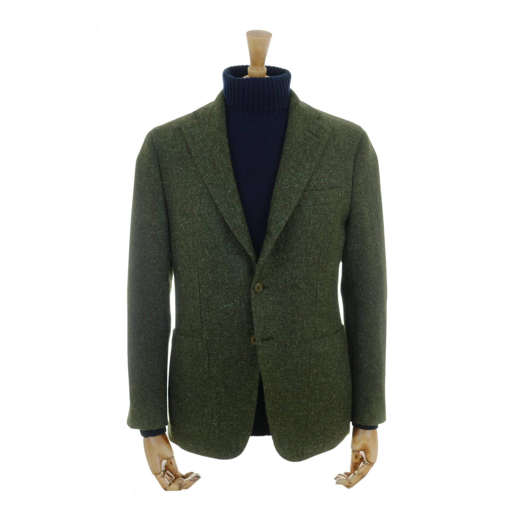 A mannequin wears the Campbells of Beauly Harris Tweed Jacket in dark olive green over a navy turtleneck, set against a plain white background.