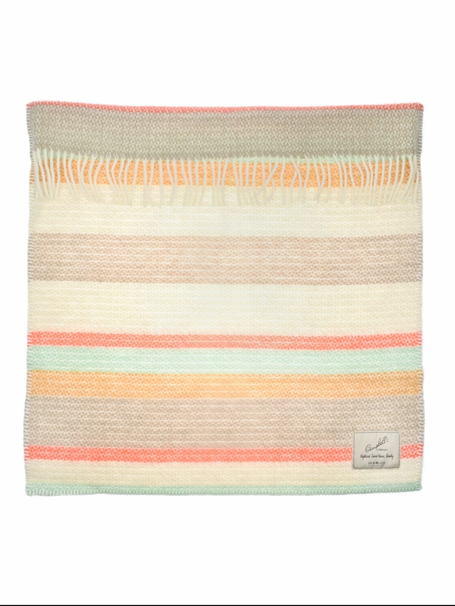 The Campbells of Beauly Baby Blanket in Soft Pastel Stripe features a woven wool design with beige, peach, orange, green, and white stripes, a short fringe top edge, soft year-round comfort, and a sewn label at the bottom right corner.