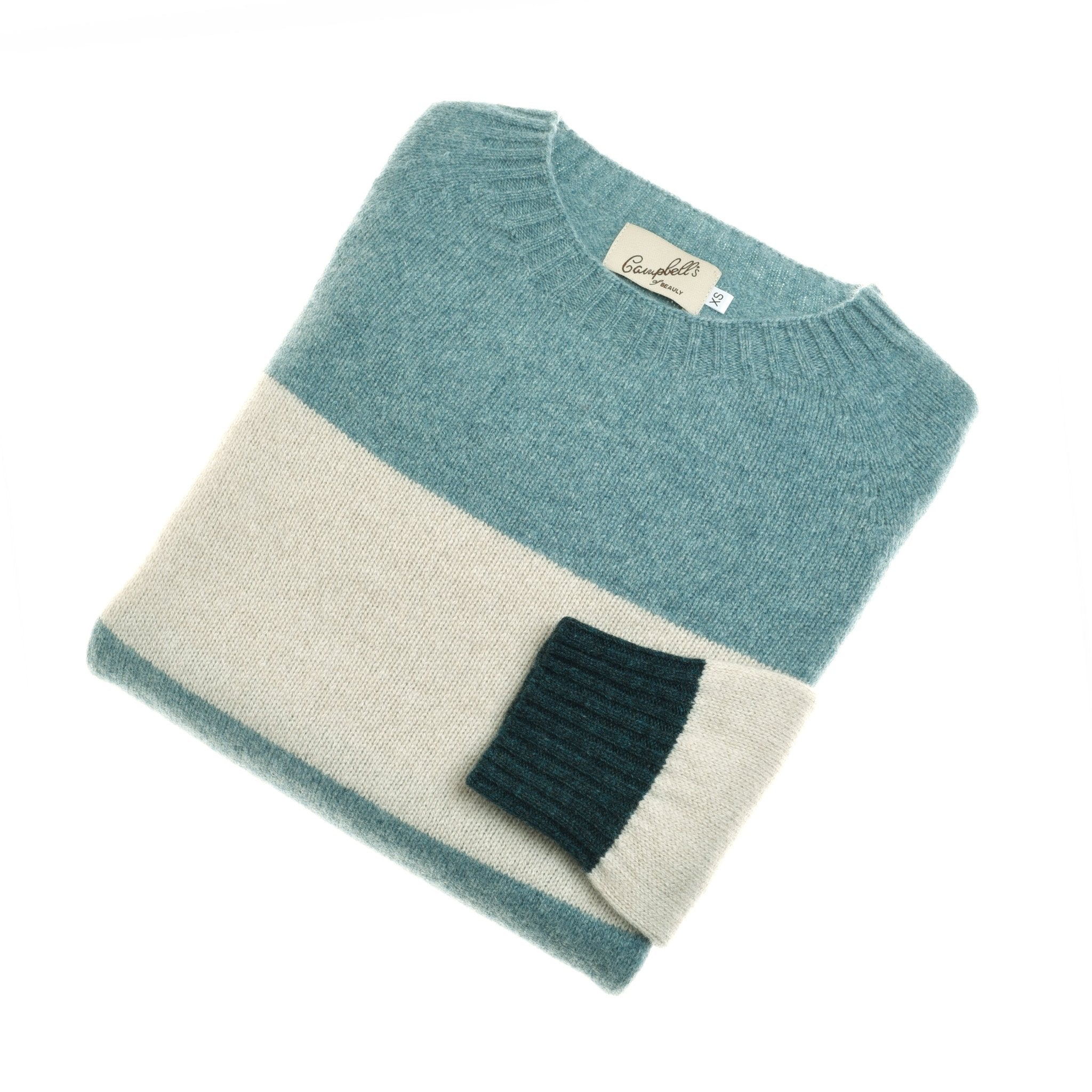 The Campbells of Beauly Stripe Crew Jumper is a teal color-block striped knit with a crew neck and dark teal cuff, made in Scotland from quality yarns, and finished with a visible brand label at the neckline.