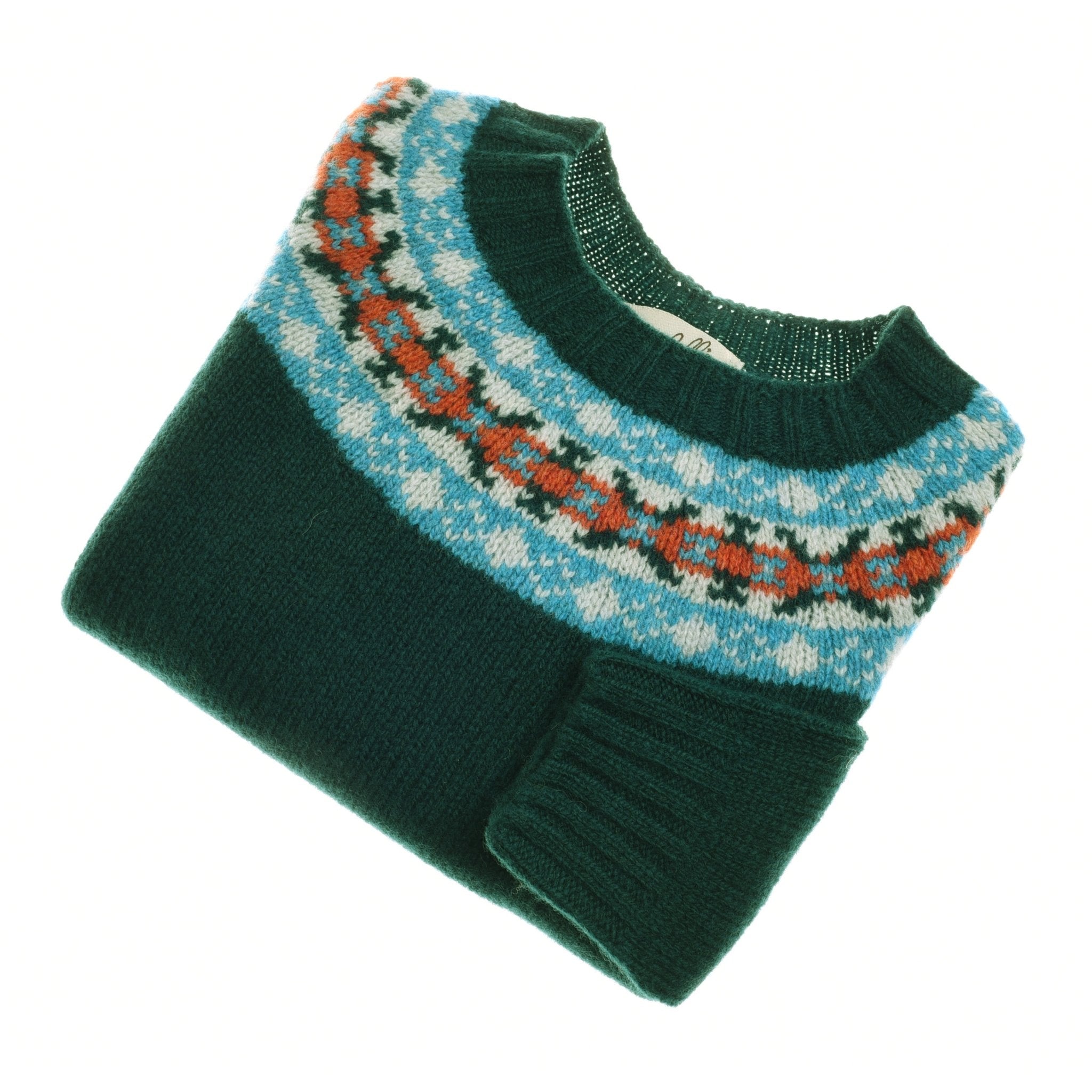 The Mini Fairisle Crew Jumper by Campbells of Beauly is a green Geelong lambswool sweater with a blue, white, and orange pattern, shown neatly folded with one sleeve tucked under on a white background.