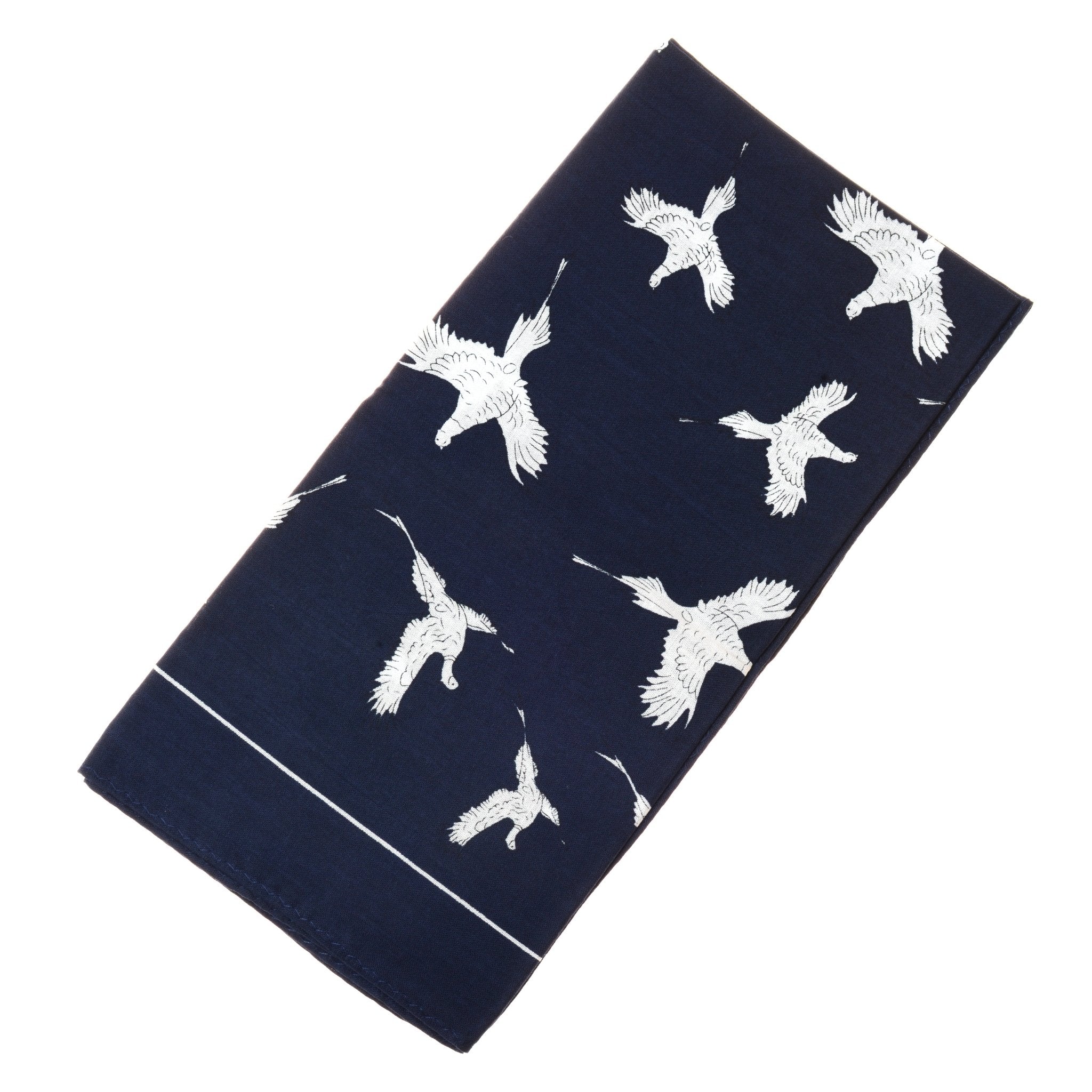 The Cotton Pheasant Hank by Campbells of Beauly is a versatile navy cotton handkerchief featuring an eye-catching print of white pheasants in flight.