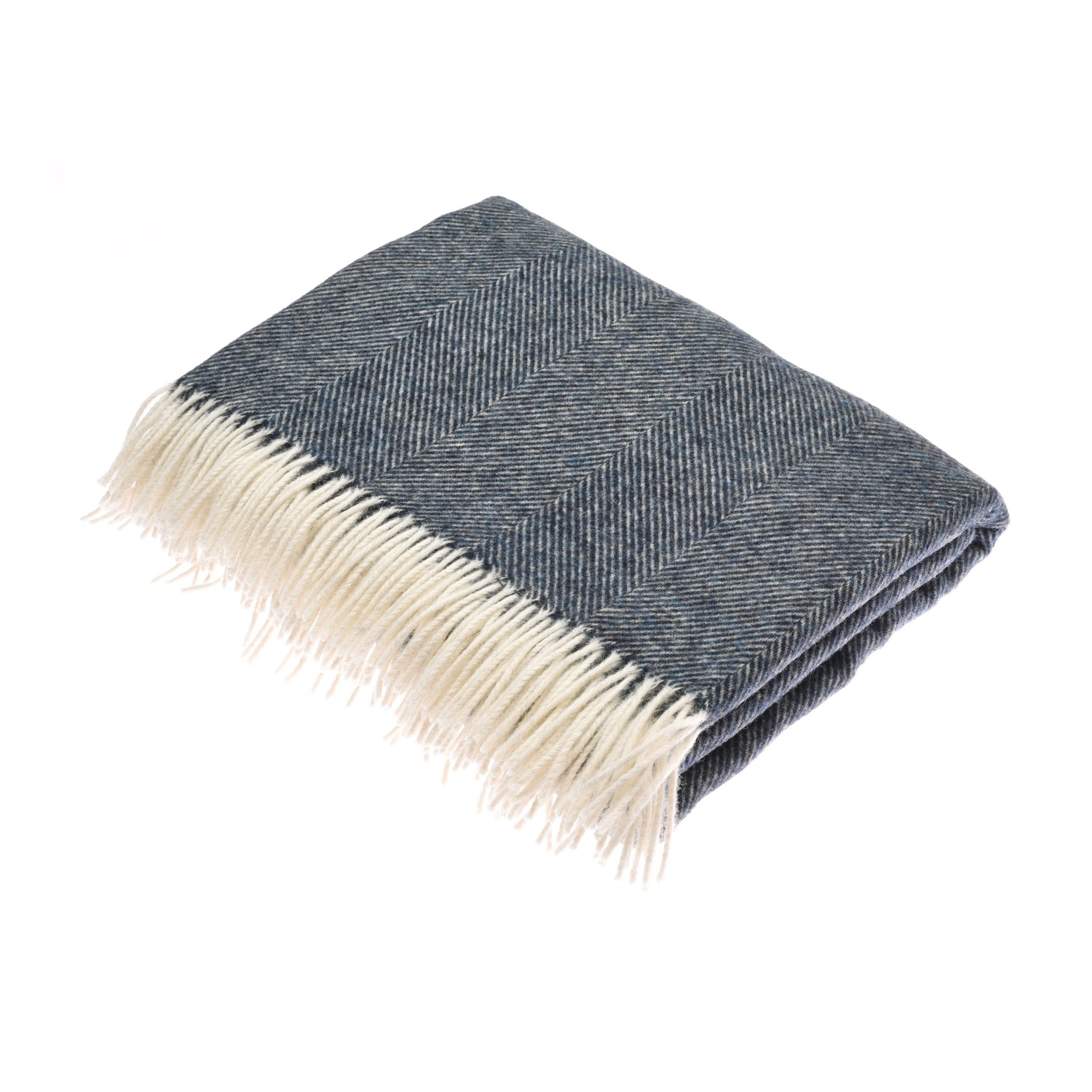 The Herringbone Lambswool Blanket by Campbells of Beauly is folded on a white background, featuring a dark blue color, classic herringbone pattern, and white fringe on one end.