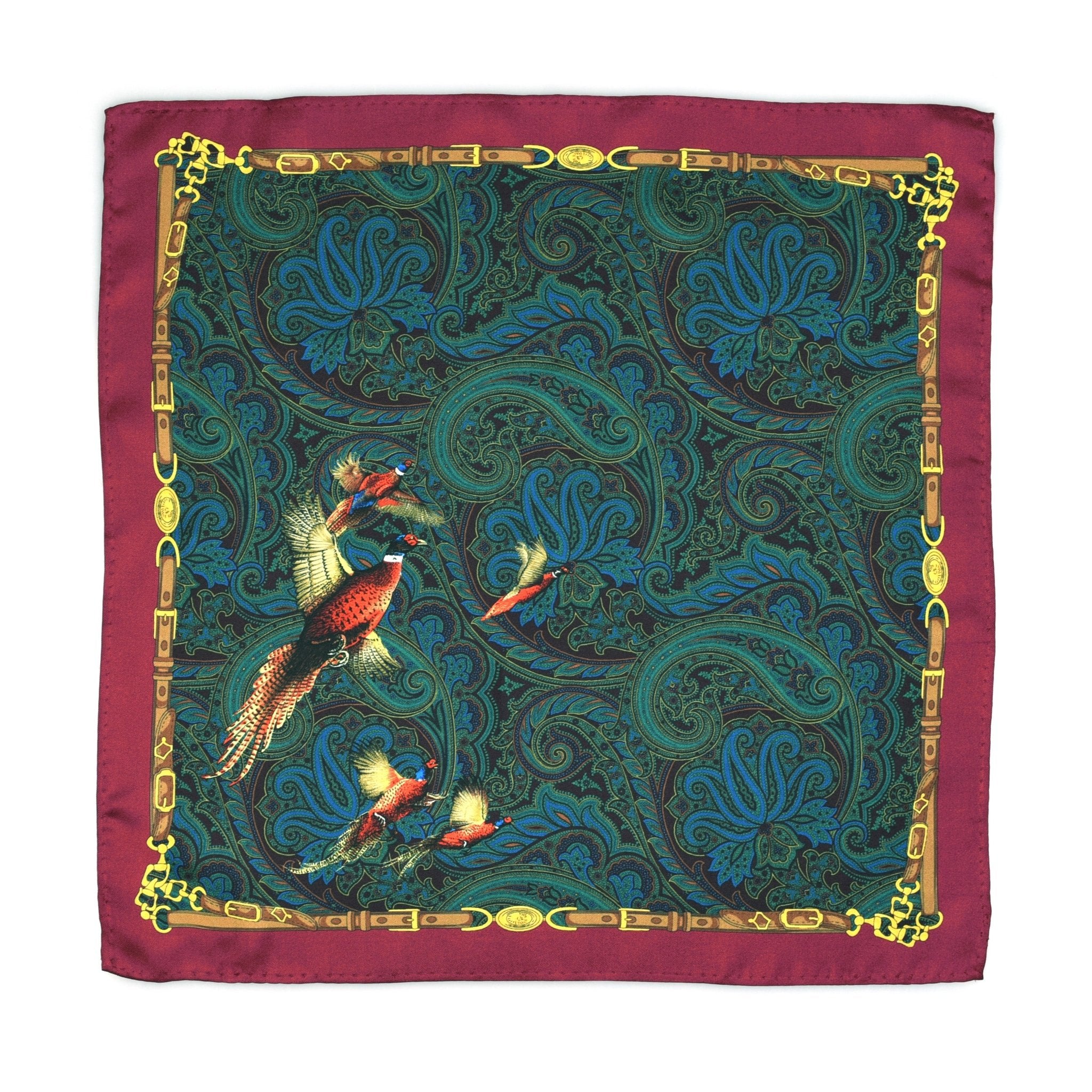 The Campbells of Beauly Silk Hank features a wine border, gold accents, and a green-blue paisley motif with colorful birds at the center. Hand-rolled edges complete this pure silk timeless accessory with decorative flair.