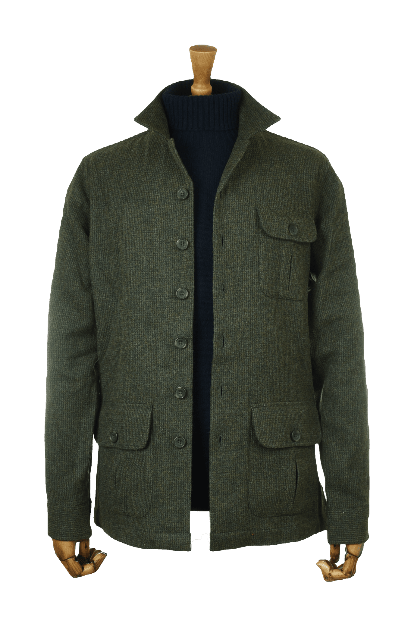 The Campbell's of Beauly Casual Shacket is a green wool button-up inspired by relaxed tailoring, featuring three front pockets. Shown on a mannequin over a dark turtleneck against a white background.