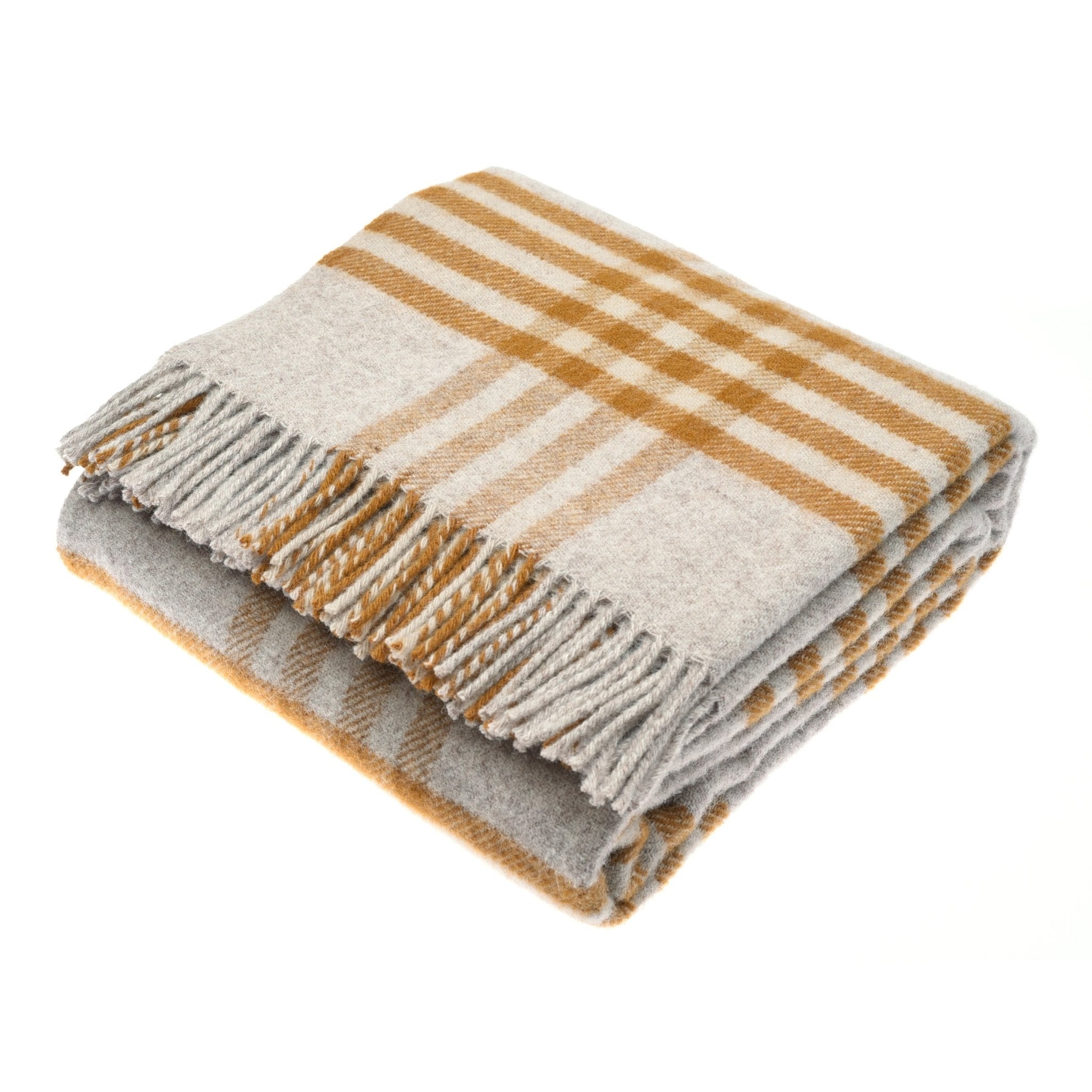 The Tarradale Lambswool Throw by Campbells of Beauly features a light gray and mustard yellow check pattern with fringe, highlighting classic British craftsmanship.