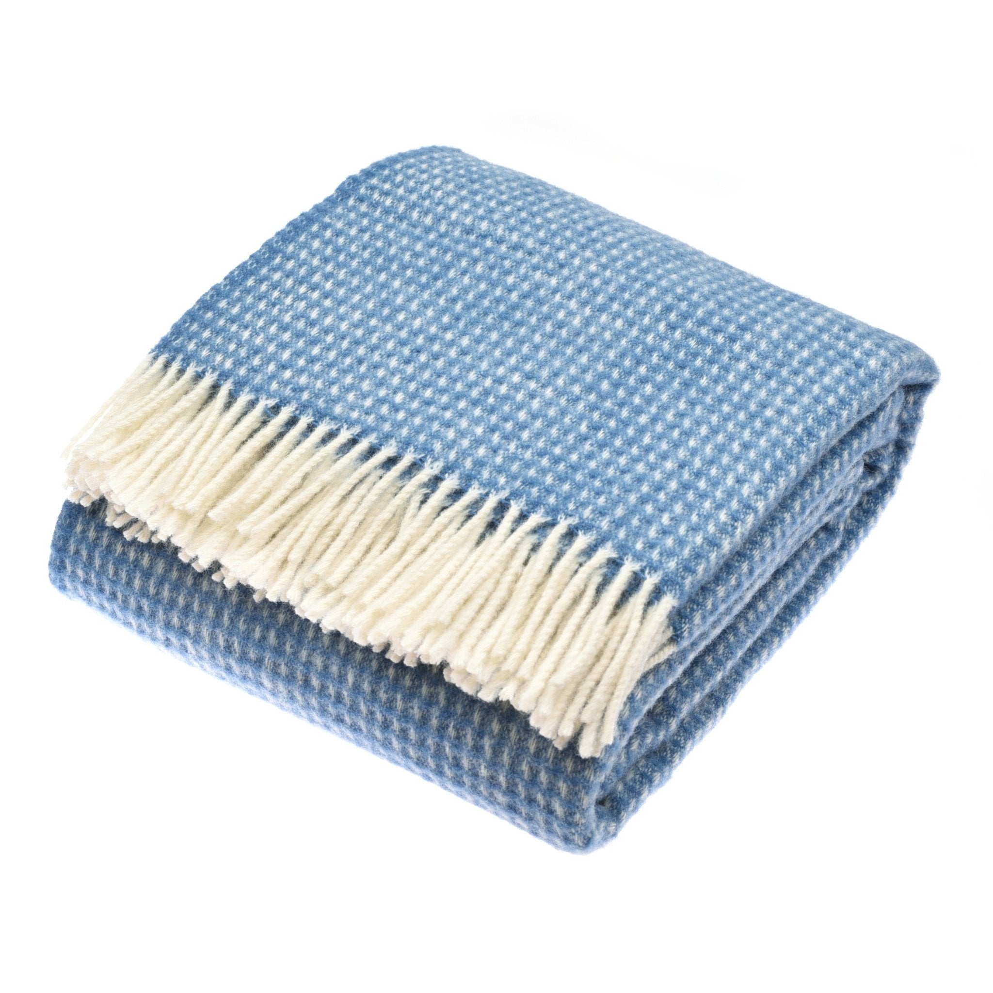 The Campbells of Beauly Honeycomb Lambswool Throw in Sky features a blue and white houndstooth pattern with a cream fringe, shown folded on a white background.