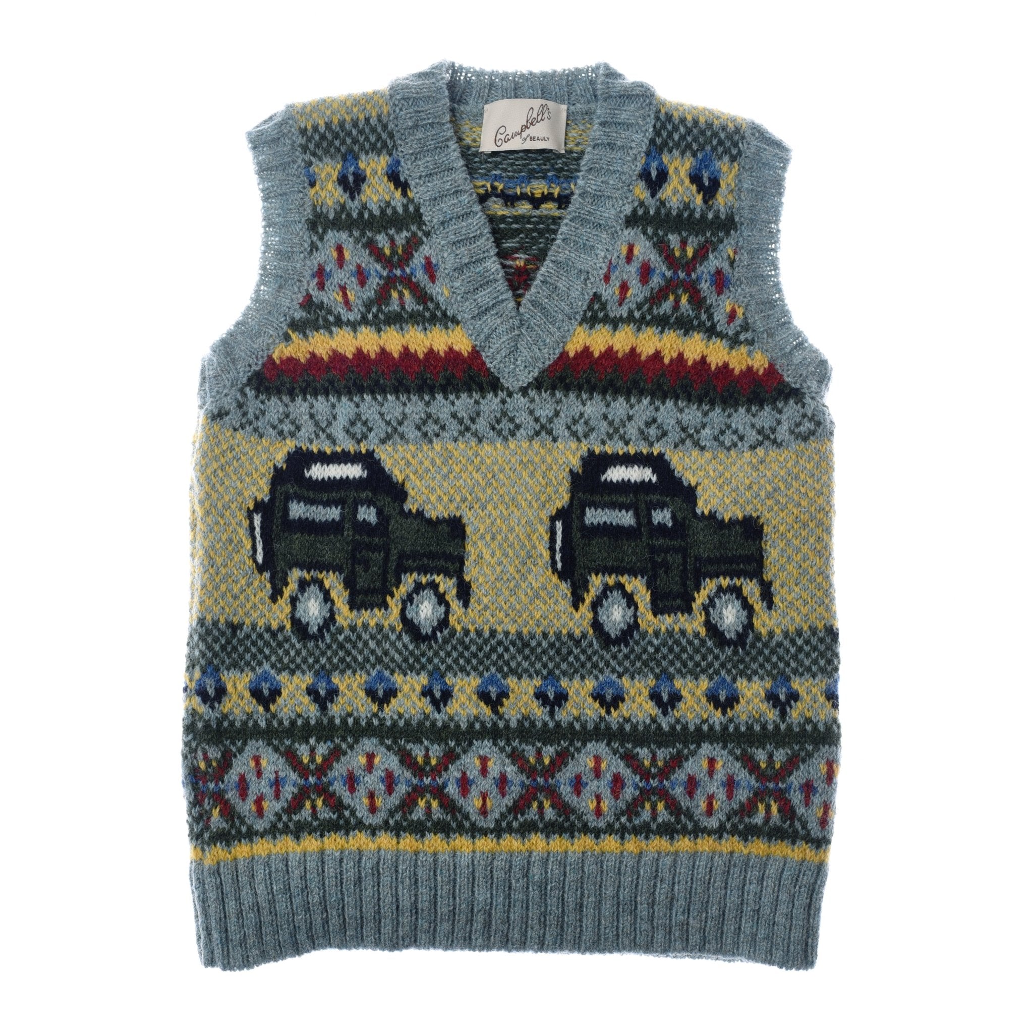 The Campbells of Beauly Mini Land Rover Defender Fairisle Slipover is a childrens lambswool sweater vest with a blue border, decorated with car and geometric patterns in blue, yellow, red, green, and gray.