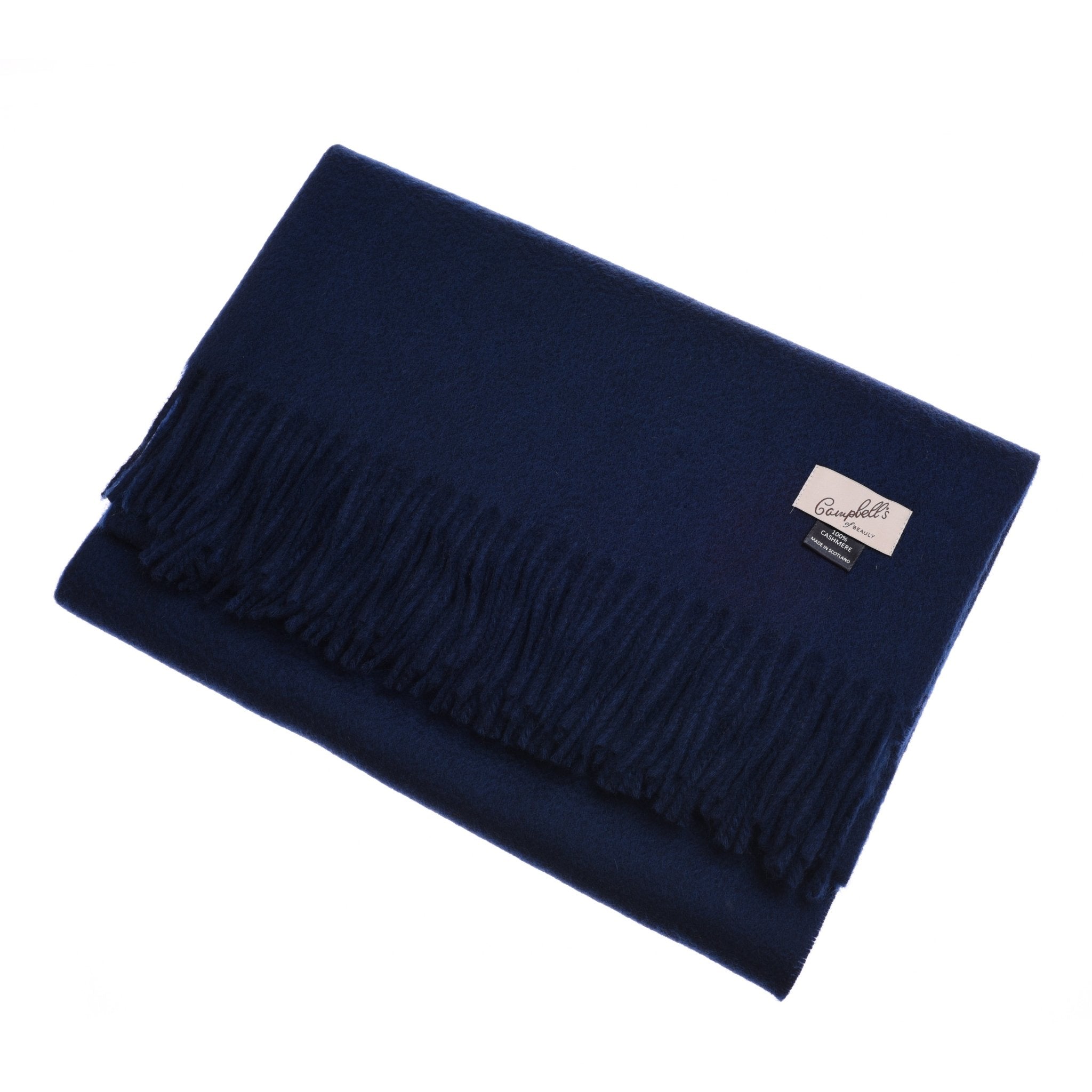 A folded dark blue Cashmere Stole by Campbells of Beauly, made from premium cashmere and finished with fringed edges and a sewn rectangular label, is displayed on a white background.