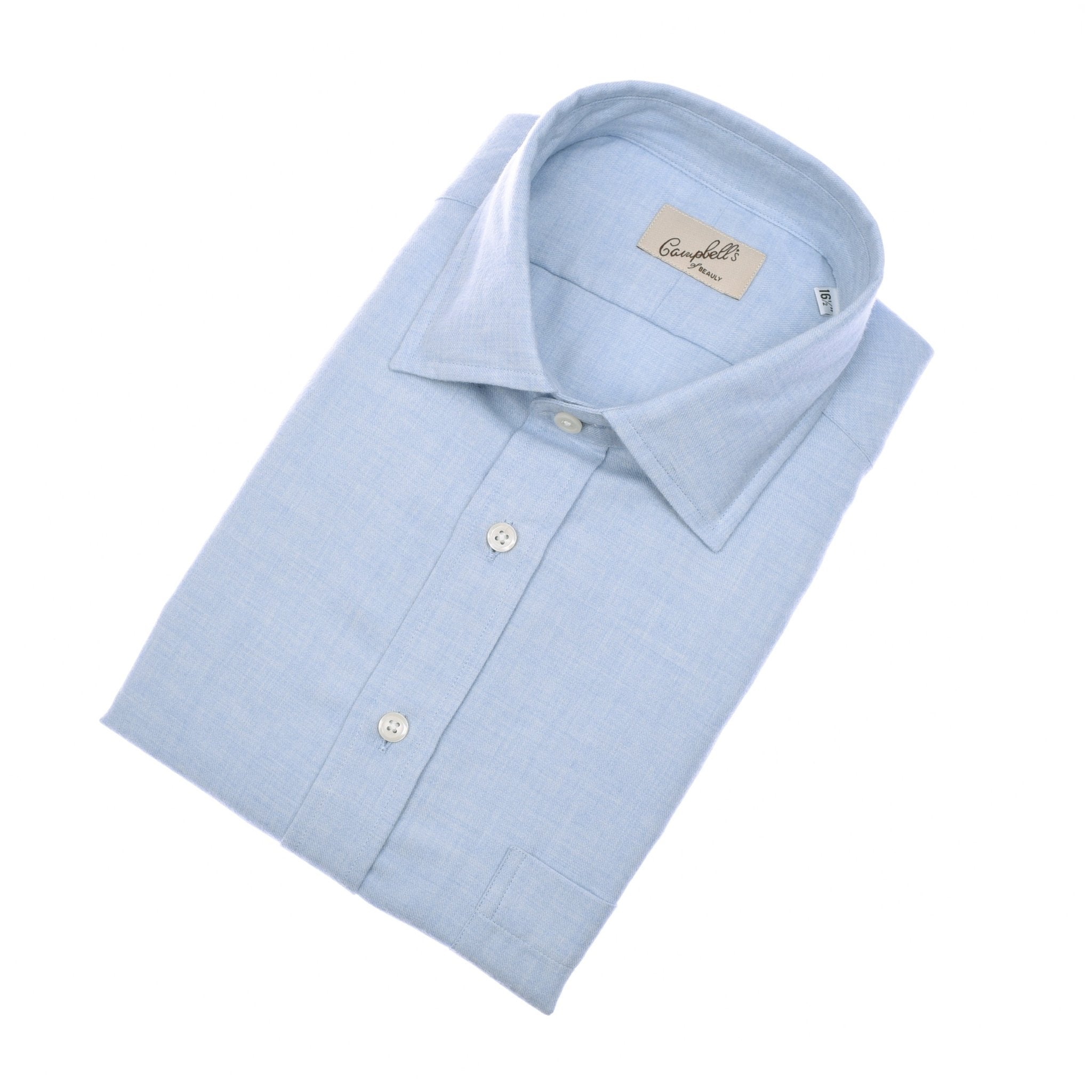 A neatly folded blue Twill Shirt by Campbell’s of Beauly with white buttons and an inner brand label, displayed on a plain white background.