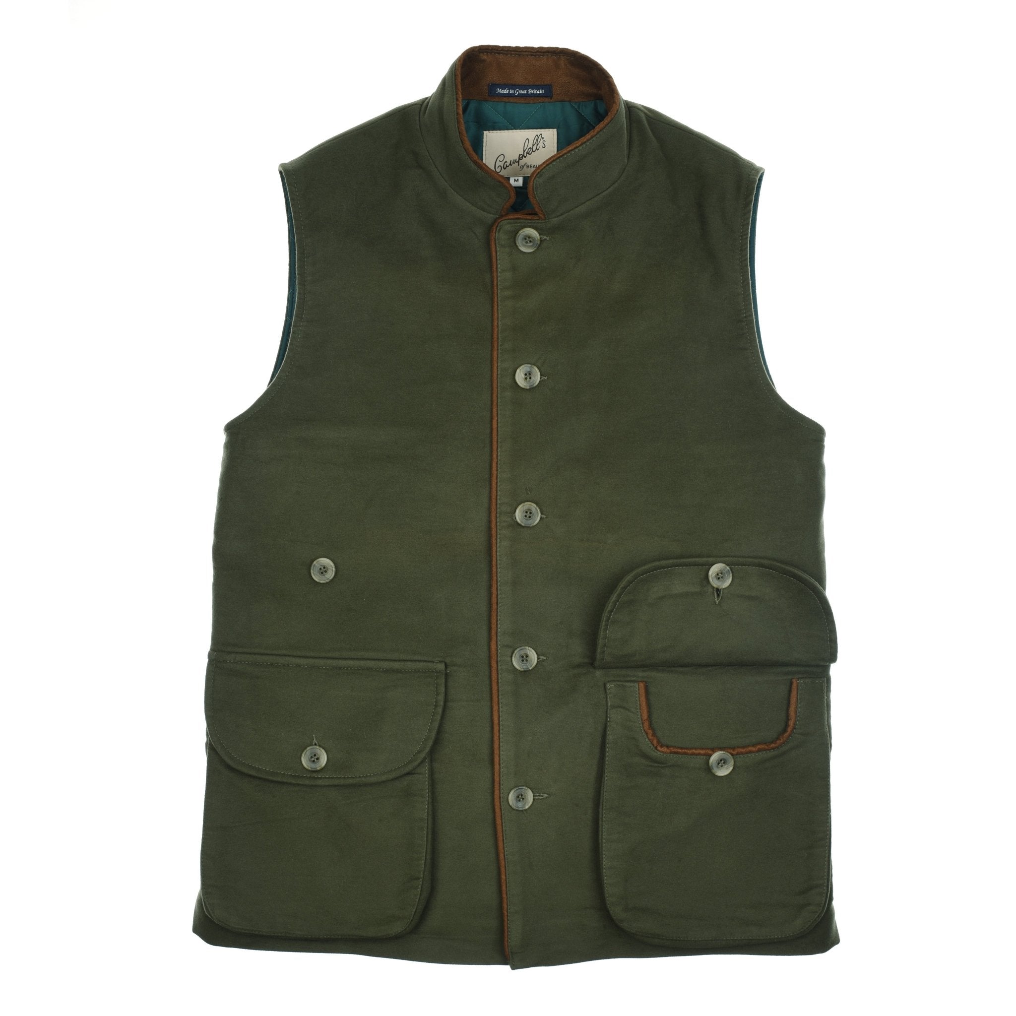 The Field Nehru Gilet by Campbells of Beauly is an olive, sleeveless vest with a stand collar, brown edging, multiple front pockets, and large buttons. Crafted from British moleskin for a classic outdoor style.