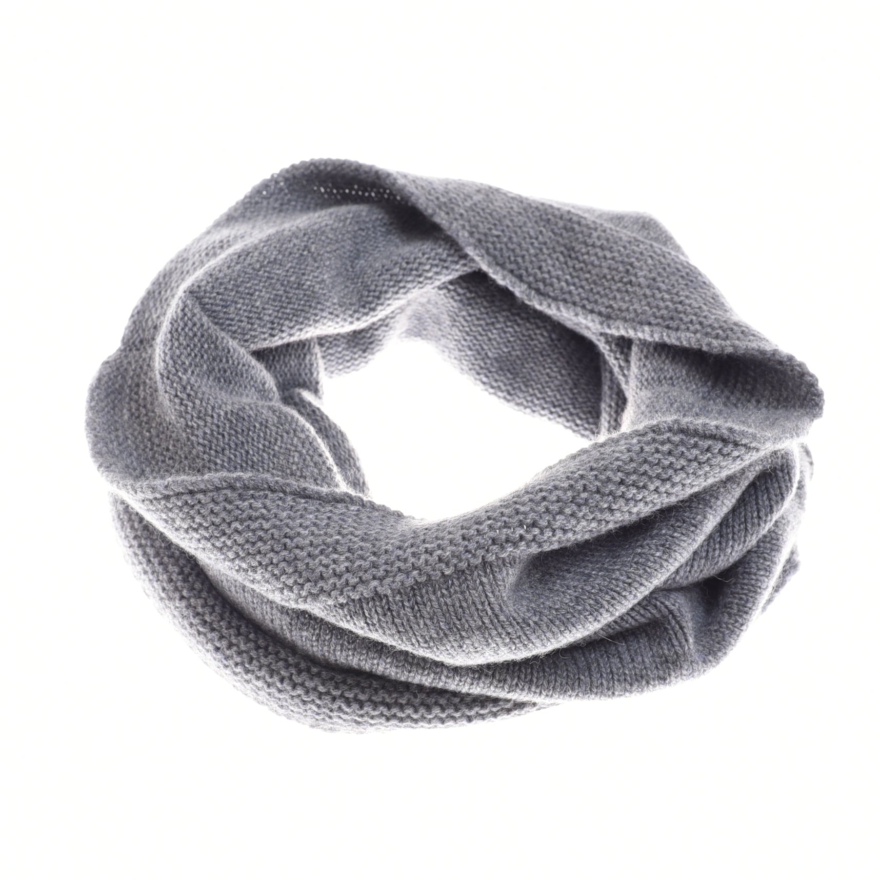 The Campbells of Beauly Cashmere Snood, shown in soft light gray, is arranged in a loose circle on a white background. Its cozy, textured fabric and seamless design highlight its warmth and softness.