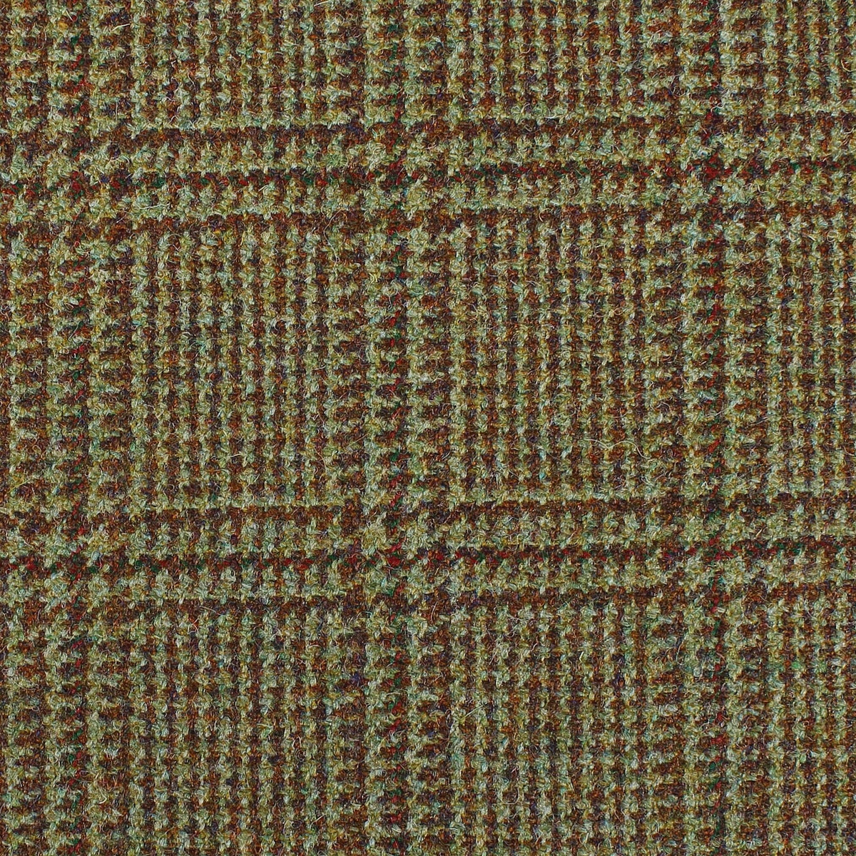 Lovat Mill Estate Tweed 066 heavyweight olive green estate tweed fabric featuring a brown and rust-colored windowpane plaid pattern.