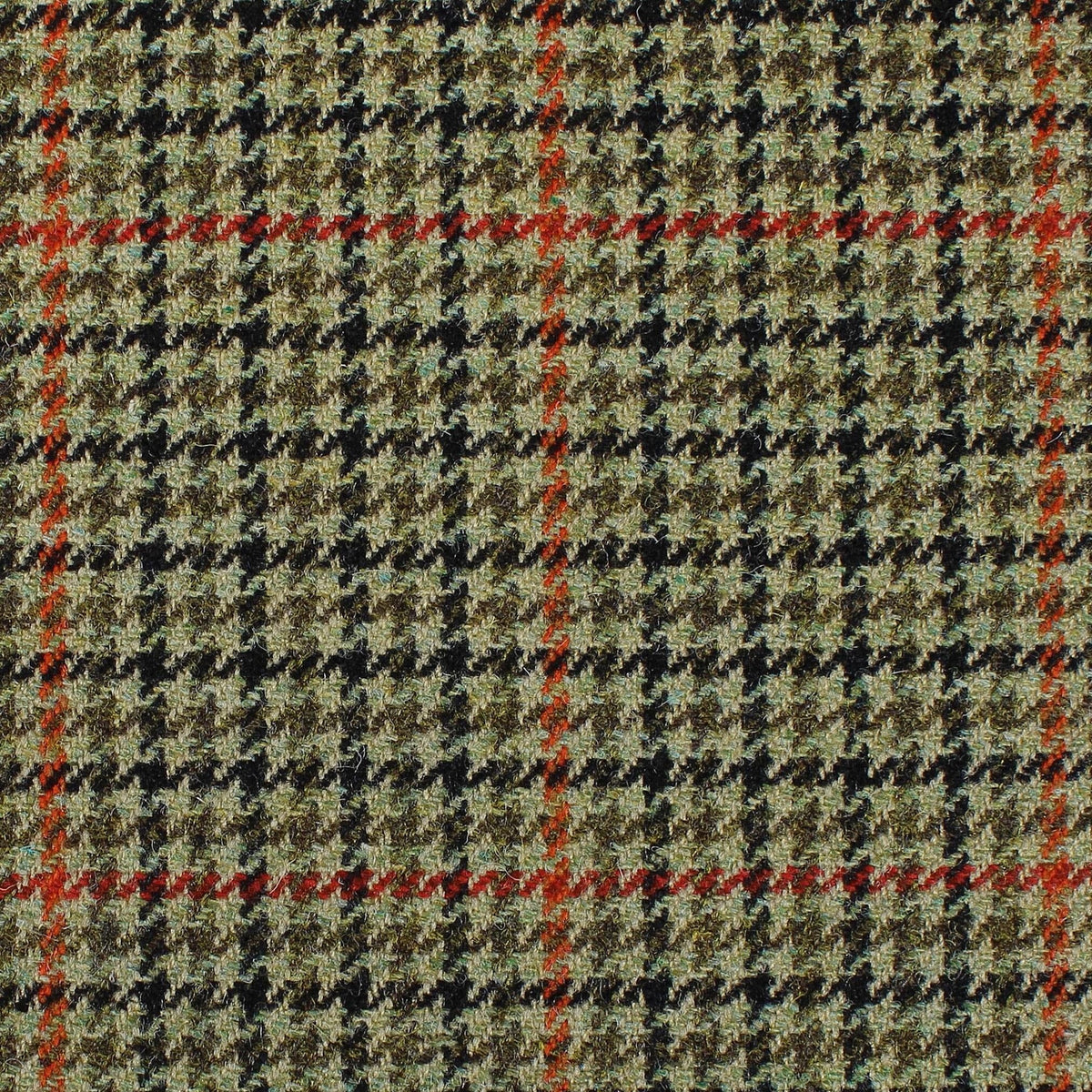 Estate Tweed 068 heavyweight wool in an olive green, brown, and black houndstooth pattern with a red and brown overcheck.