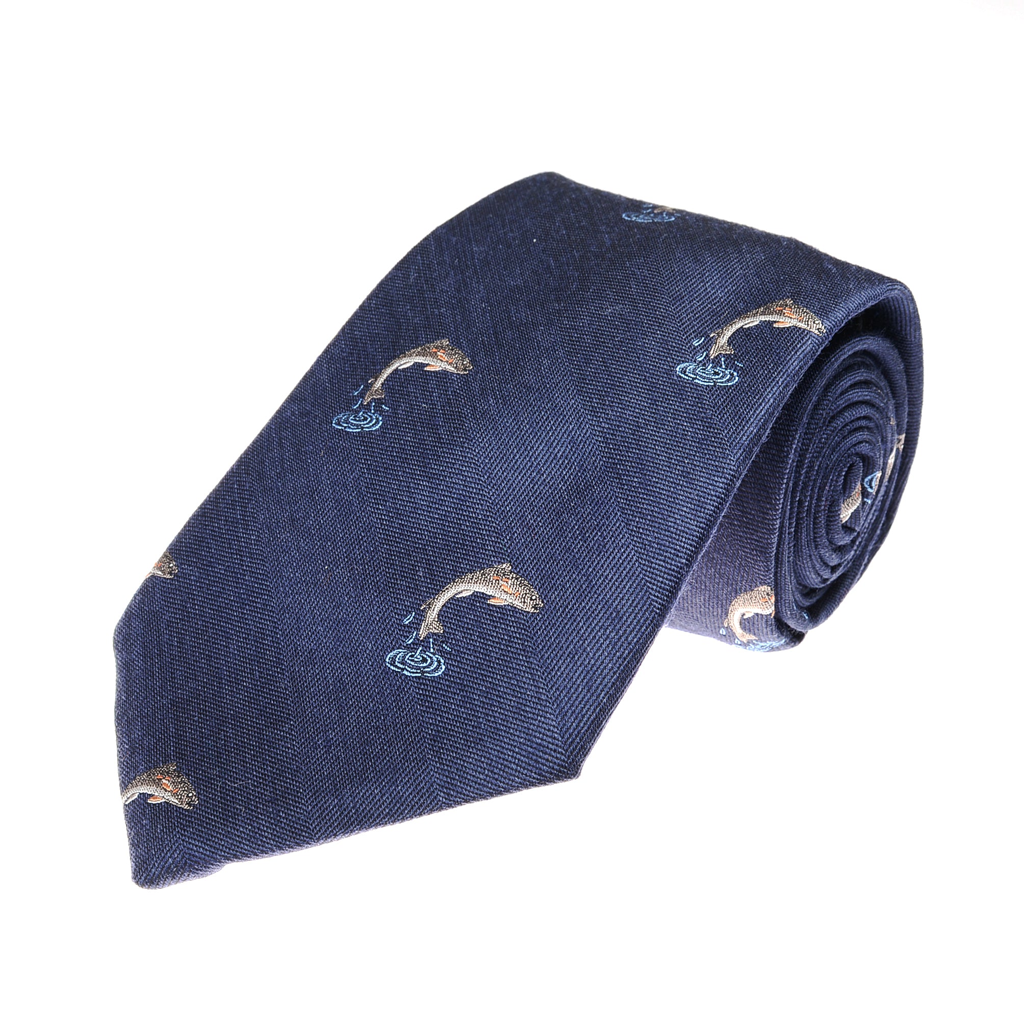 The Salmon Silk Tie by Campbells of Beauly is a navy handmade silk tie featuring a leaping salmon motif with small fish embroidered in light brown and blue threads, shown on a white background.