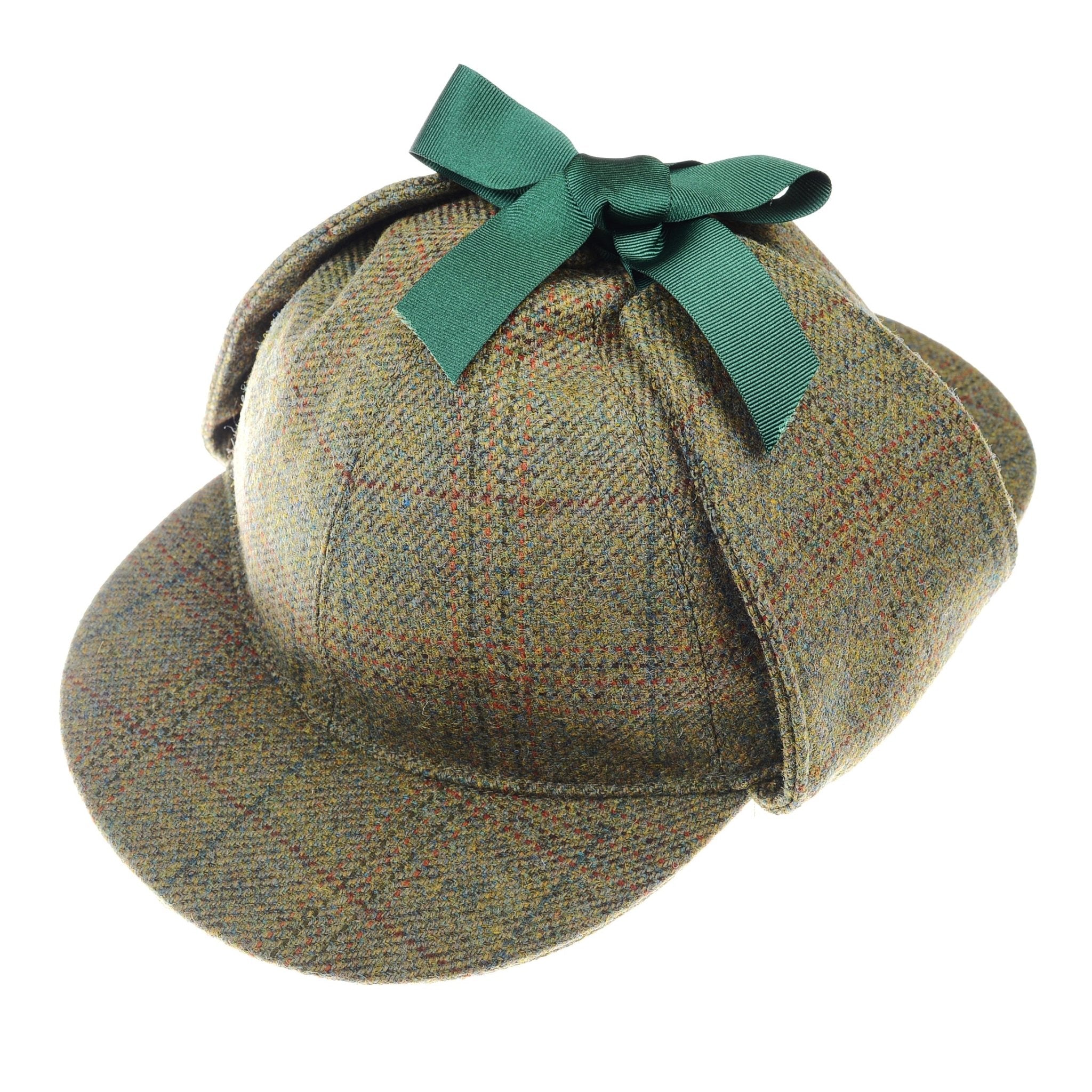 The Sherlock Holmes Hat by Campbells of Beauly in color G2102 features greenish-brown plaid fabric, classic earflaps, and a green ribbon bow on top—an iconic deerstalker style, shown on a white background.