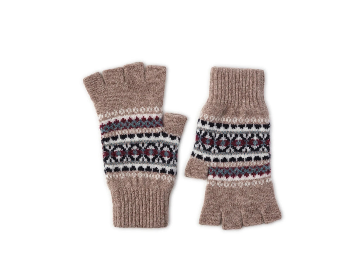 The Auld Stock Fairisle Half-Finger Gloves by Campbell’s of Beauly are knitted, fingerless gloves crafted from soft lambswool in light brown, featuring classic Scottish knitwear details with black, white, and red Fairisle pattern bands across the middle, displayed on a white background.