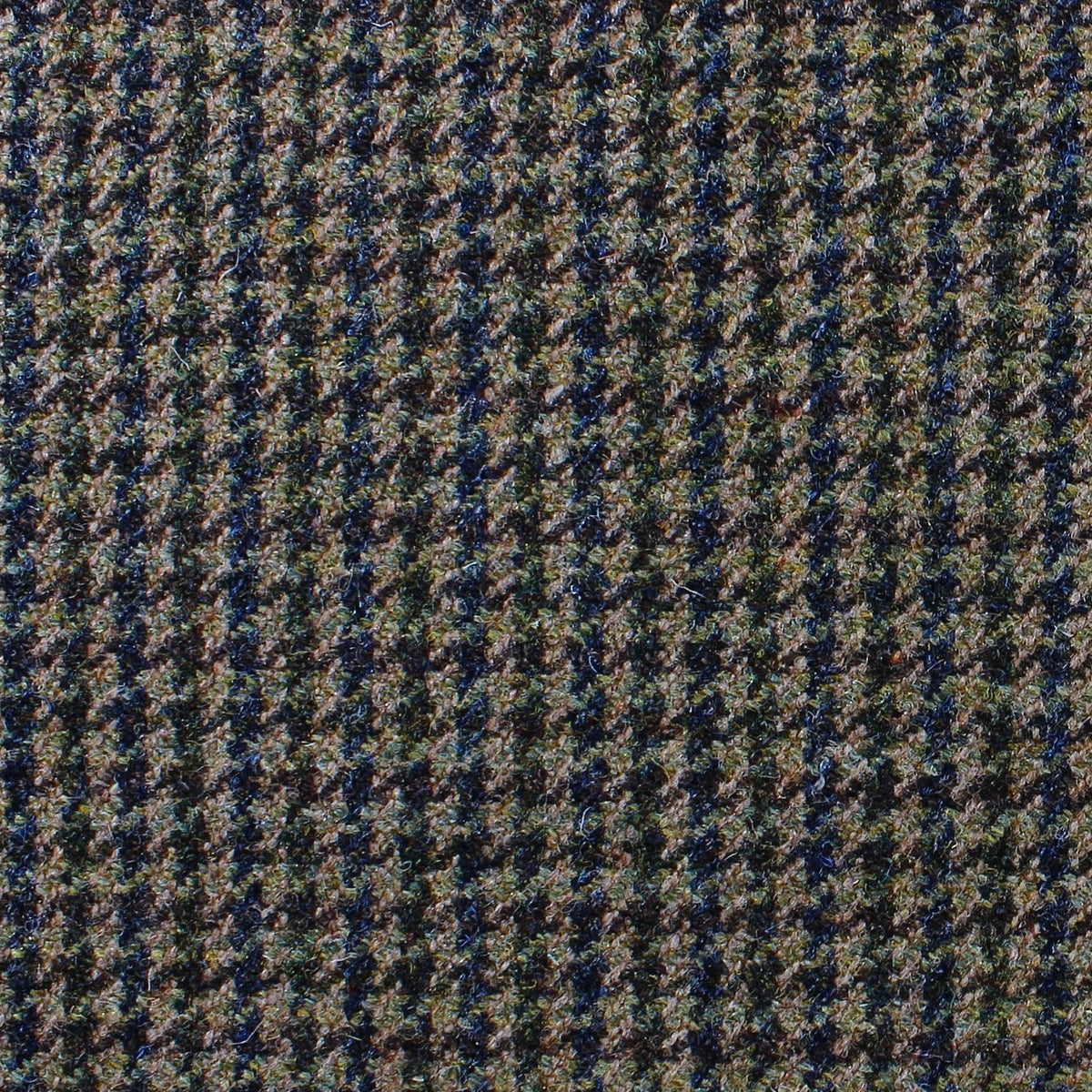 Close-up of a dark olive and black Estate Tweed 007 fabric in a houndstooth pattern.