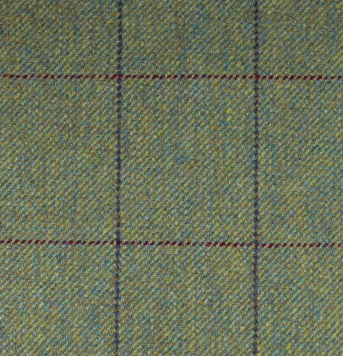 Field Tweed 085 green herringbone Scottish tweed fabric featuring a dark blue and thin maroon windowpane check pattern.