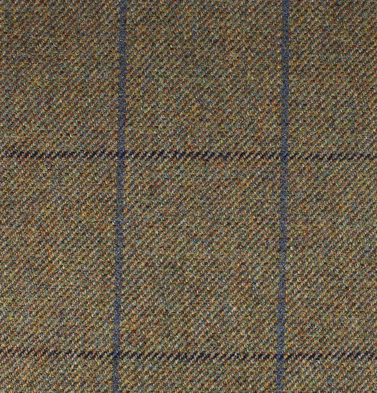 Field Tweed 089 in 100% wool Scottish tweed, featuring a brown and green base with a subtle blue and dark brown windowpane check pattern.
