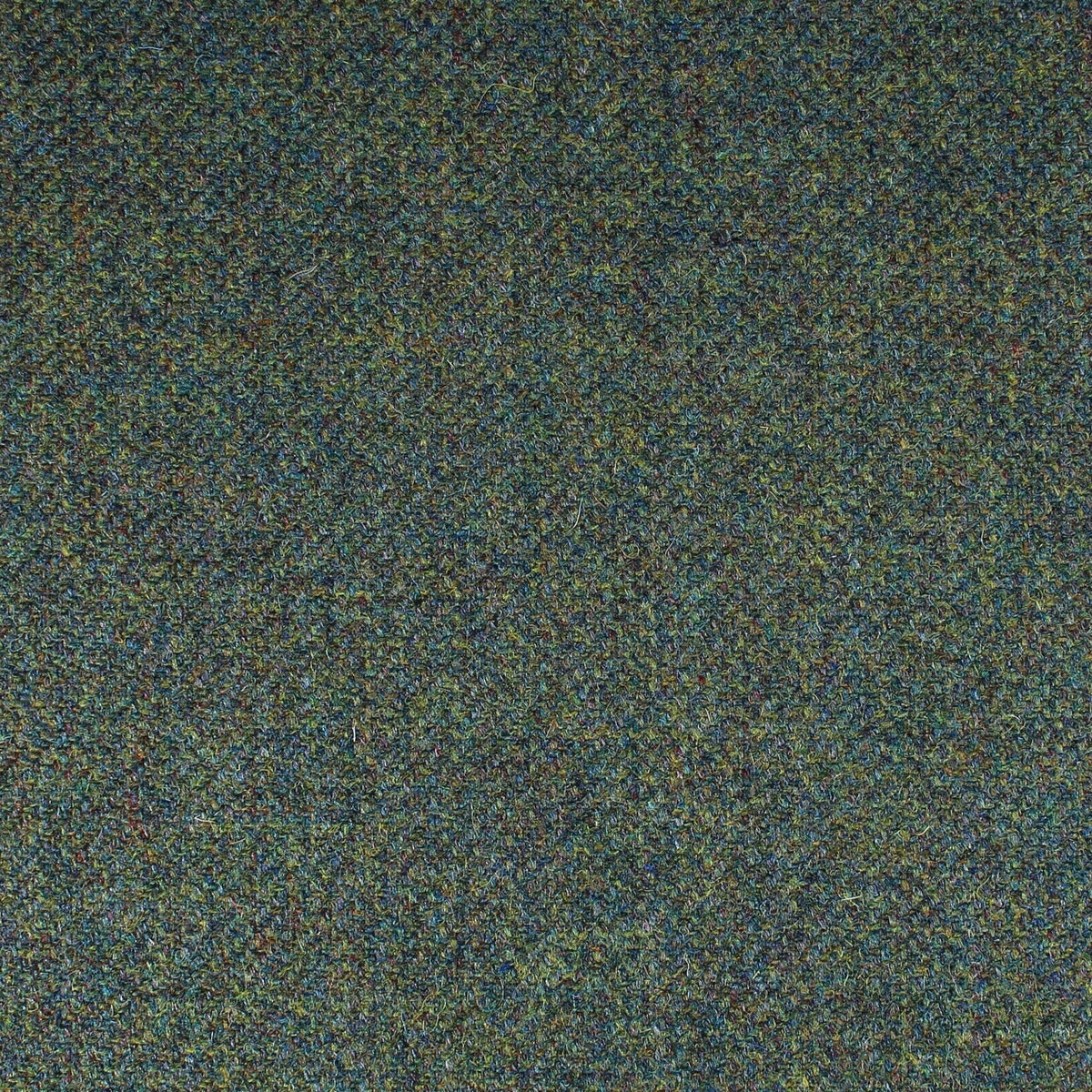 Field Tweed 109 dark green 100% wool fabric with a speckled, multicolored Scottish tweed weave.