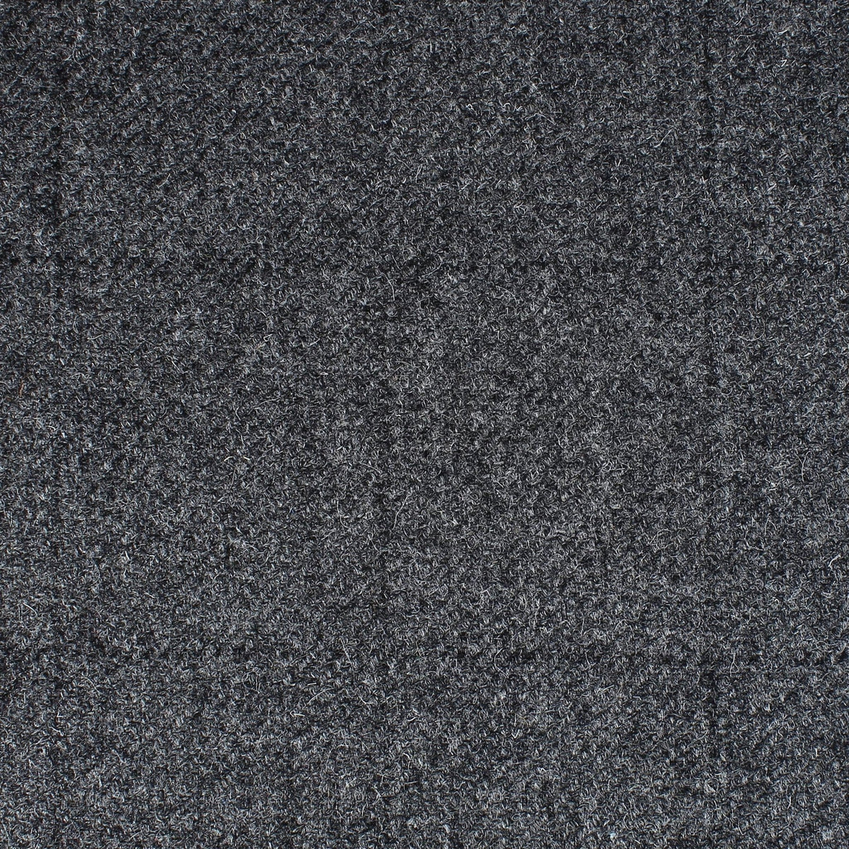 Field Tweed 113 in dark charcoal gray Scottish wool tweed with a subtle heathered texture.