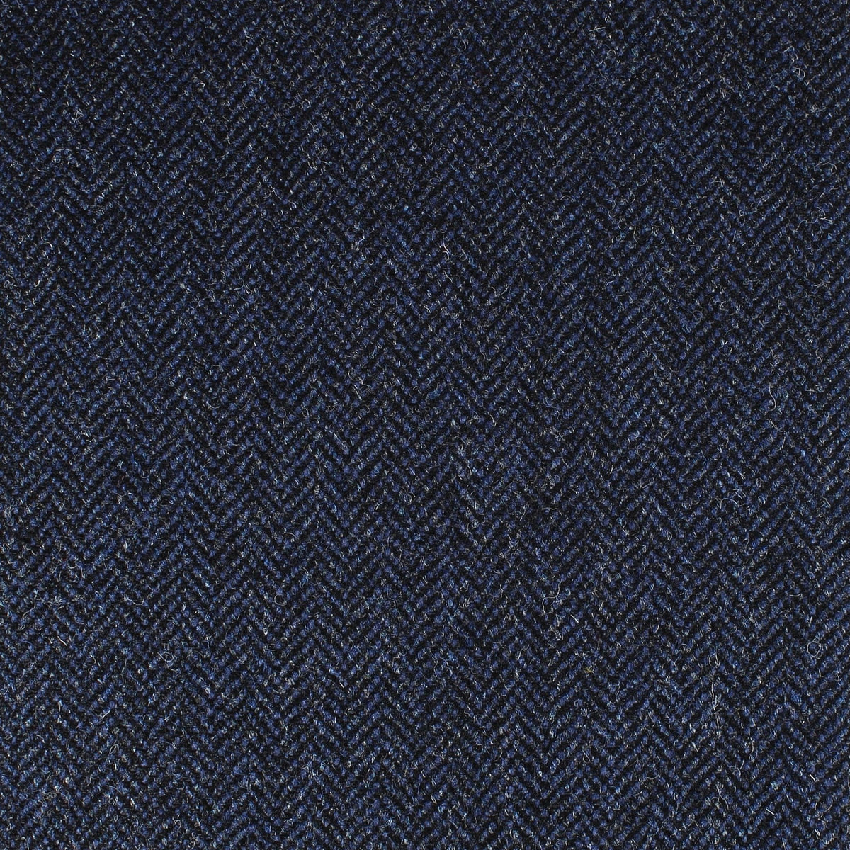 Field Tweed 120 dark blue Scottish tweed fabric with a fine, textured herringbone weave.