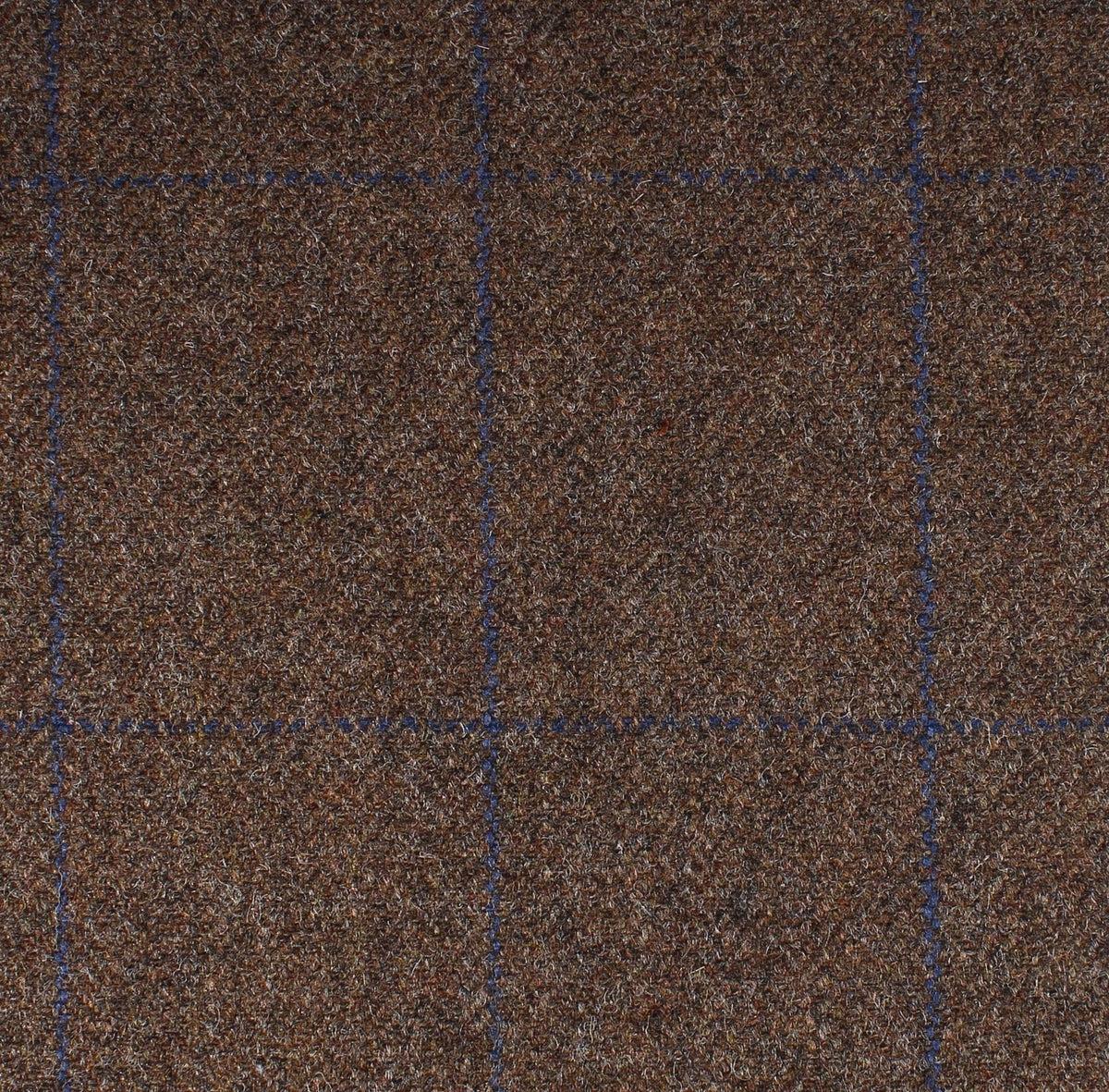 Field Tweed 135 brown Scottish tweed fabric featuring a dark blue grid pattern.