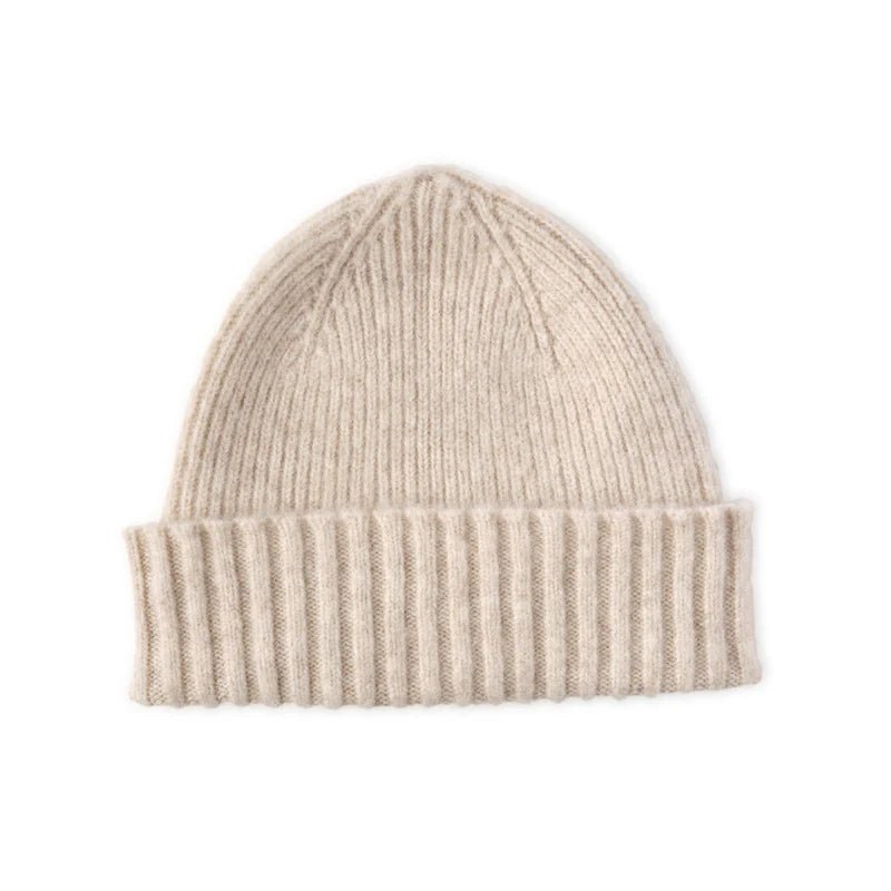 The Lambswool Hat Cream by Campbell’s of Beauly is a beige knitted hat with a folded ribbed brim, shown on a white background—ideal for premium winter style.