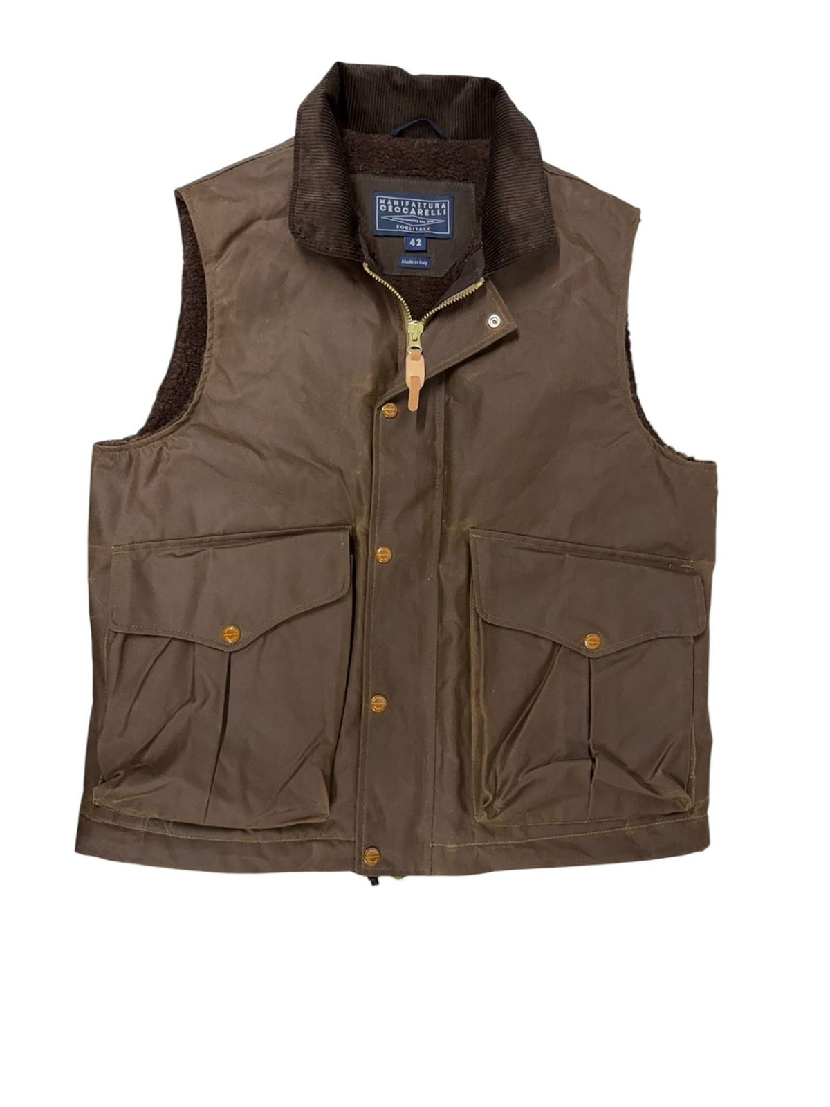 Dark tan sleeveless Wax Nehru Gilet by Campbell’s of Beauly, featuring a waxed cotton finish, front pockets, snap buttons, and a corduroy collar. Reminiscent of a classic country vest, it is displayed flat against a white background.