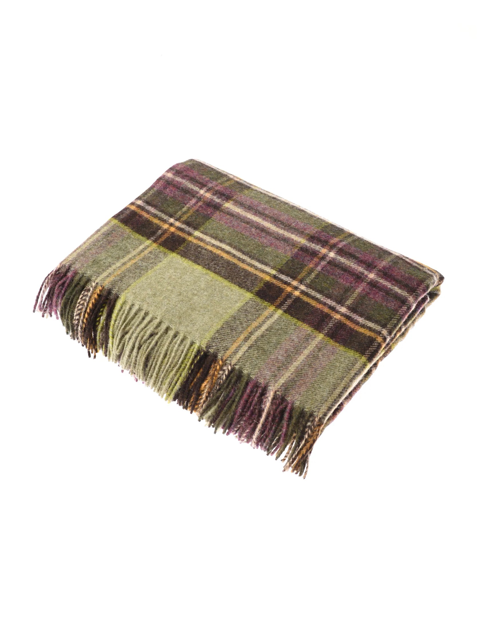 The Strathglass Throw by Campbells of Beauly is a folded lambswool blanket with fringed edges in a green, purple, and brown plaid, set against a white background for a look of warmth and classic charm.