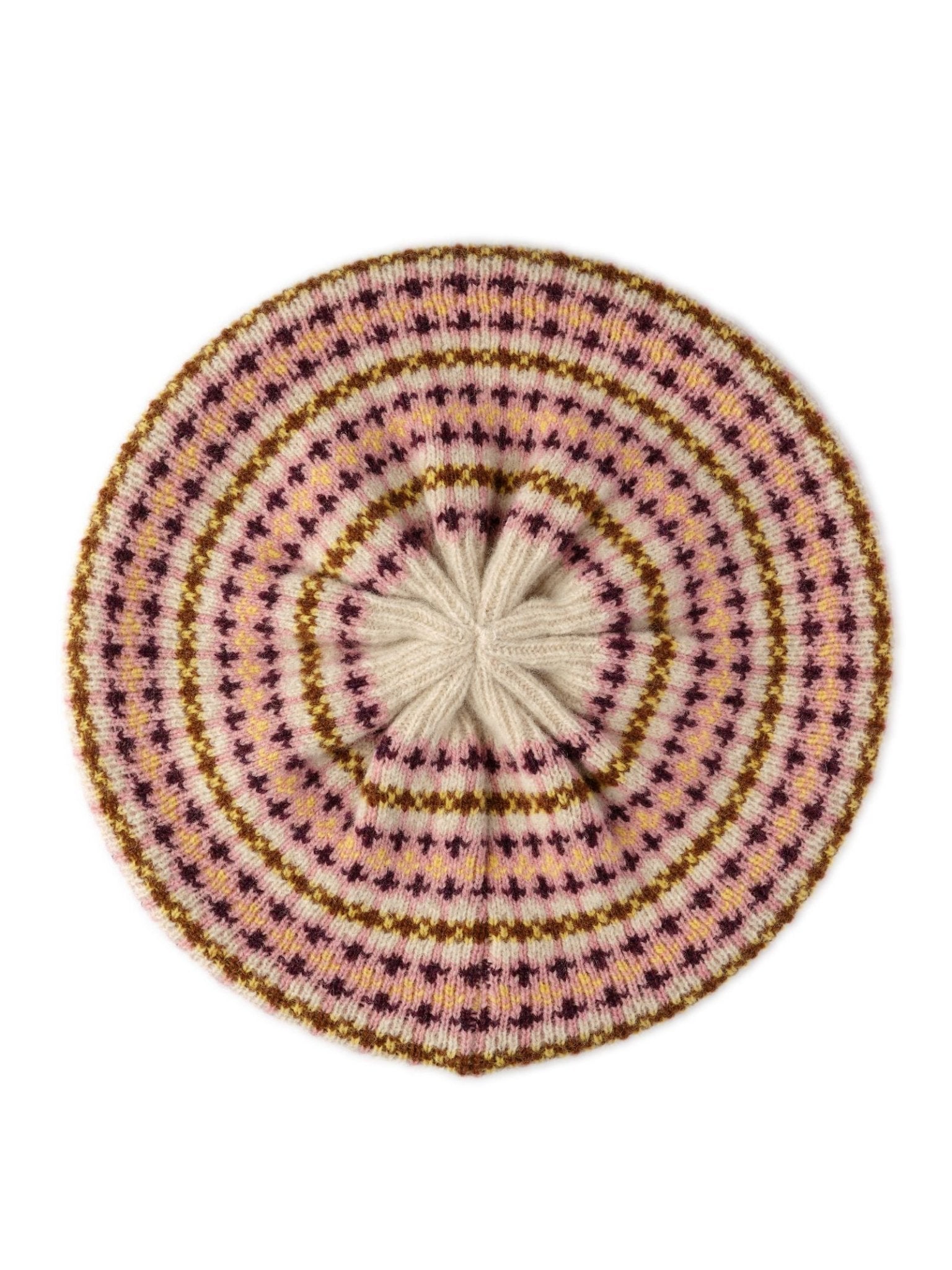 The Fairisle Beret by Campbell's of Beauly features a circular knitted pattern in cream, pink, purple, and brown with concentric rows of small X-shaped designs inspired by traditional Scottish Fairisle knitting.