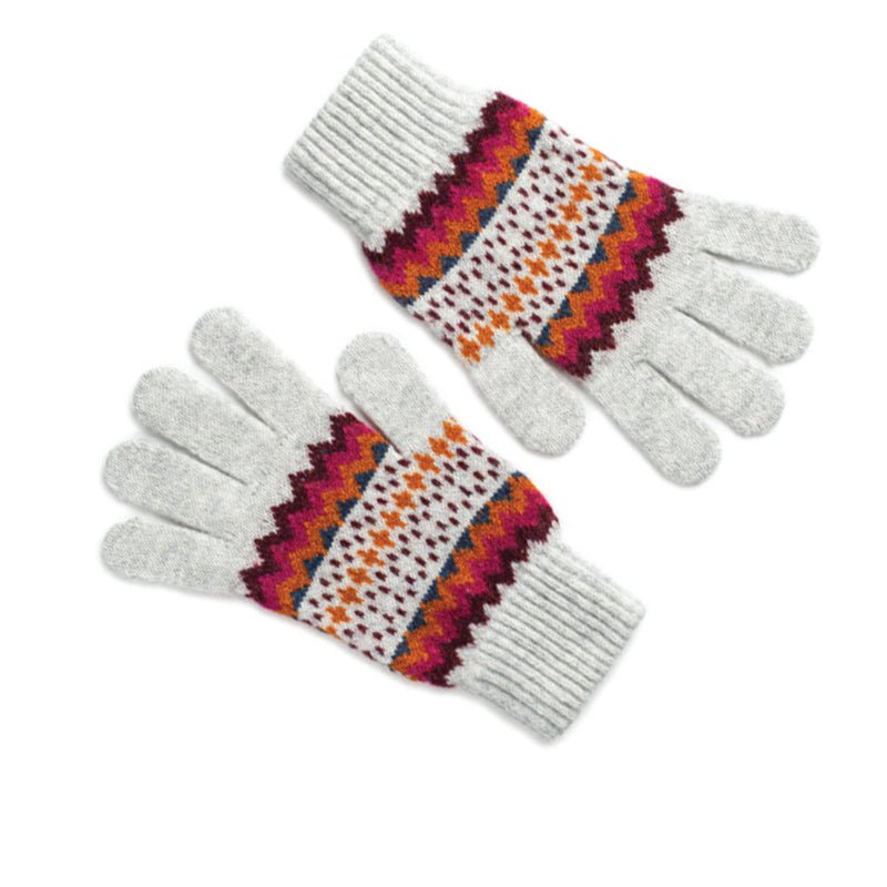 Fairisle Gloves by Campbells of Beauly in Winter White feature knitted lambswool with colorful Fairisle zigzag and dot patterns in red, orange, burgundy, and white across the back of the hands and wrists.