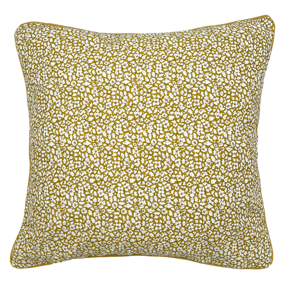 The Liberty Print Cushion Cover by Campbells of Beauly features a mustard yellow background with a dense white floral pattern, rounded corners, and a soft, plush look inspired by classic Liberty Print cushions.