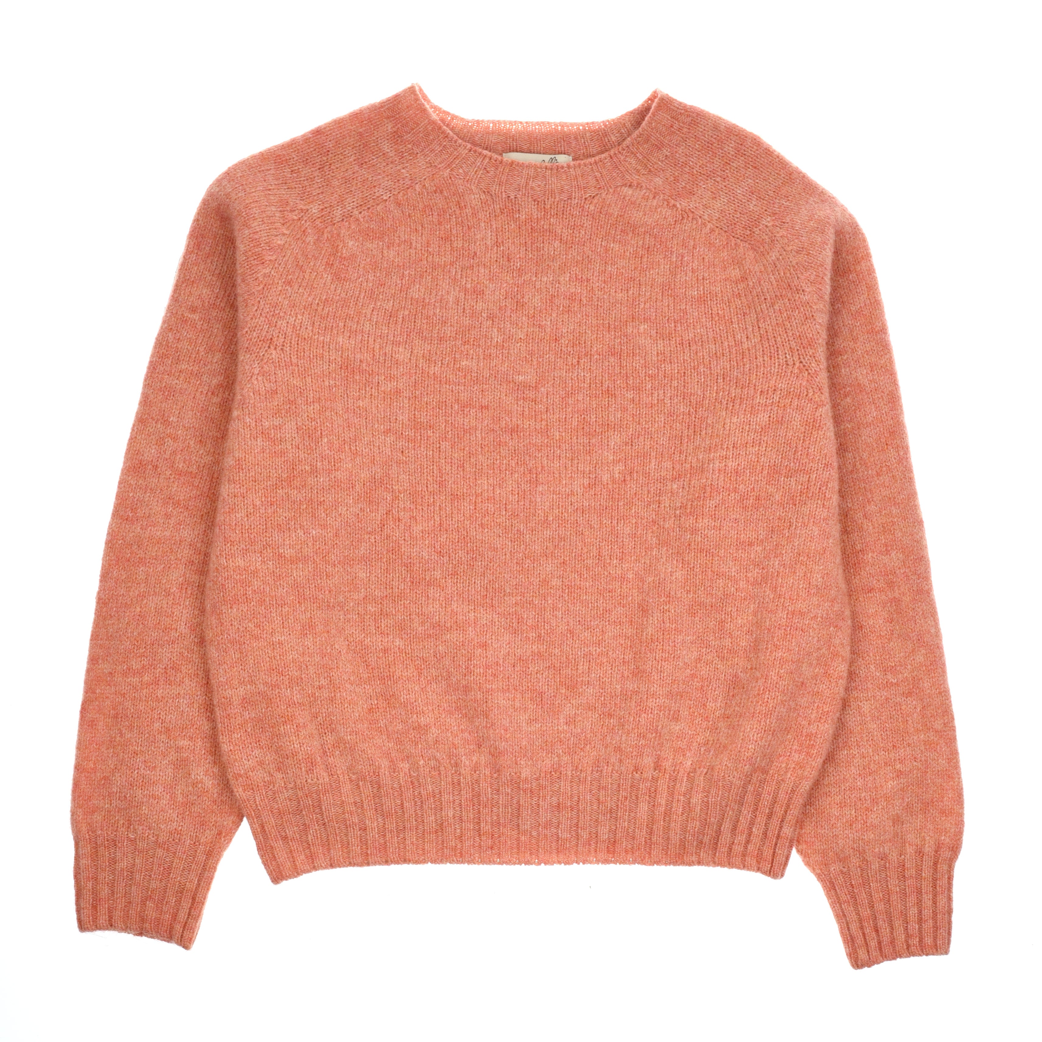 The Cropped Shetland Jumper by Campbells of Beauly is a long-sleeved, crew-neck sweater in soft lambswool with ribbed trim and a muted coral hue, shown laid flat on a white background.