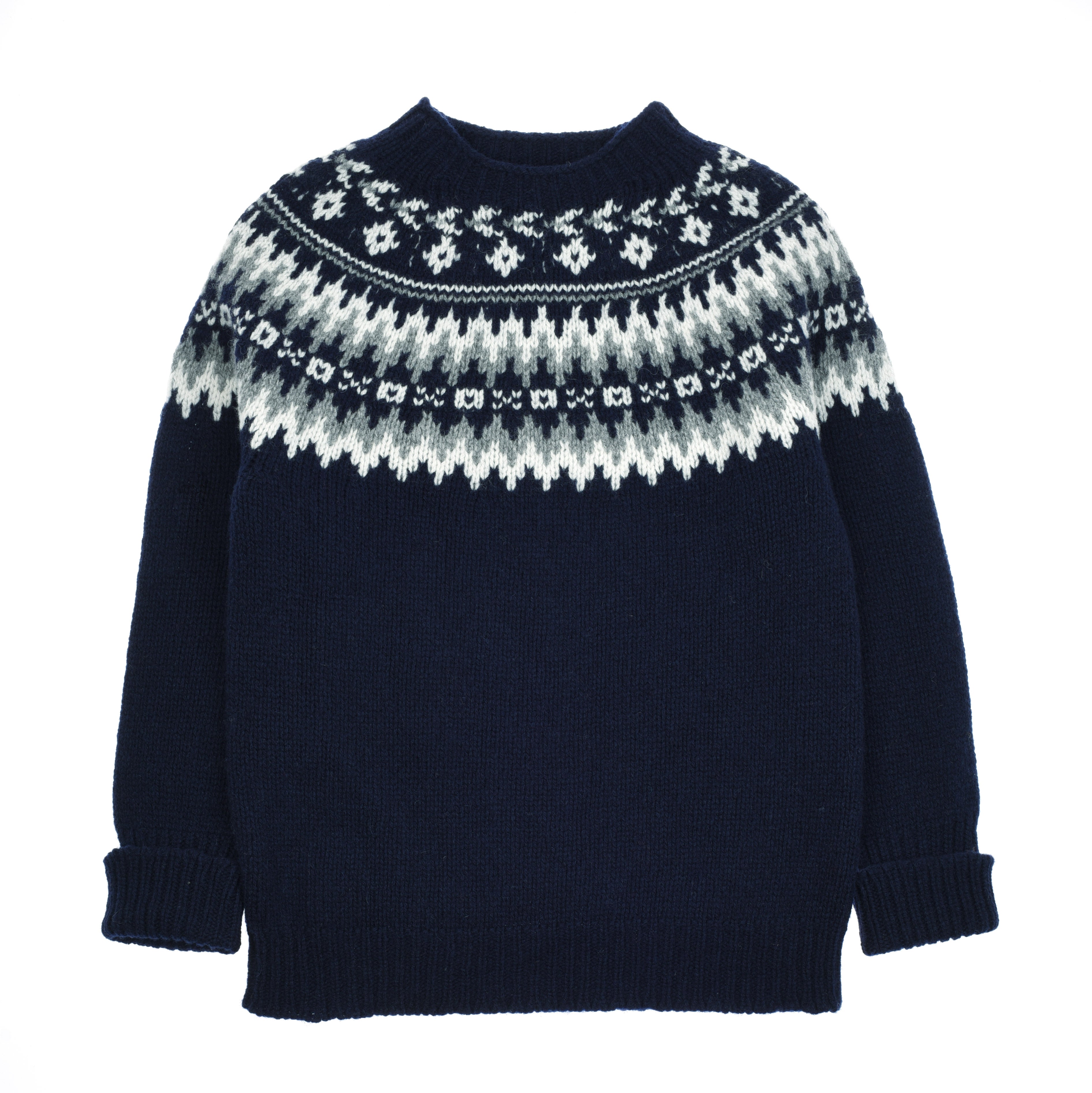 The Chunky Fairisle Jumper by Campbells of Beauly is a dark navy blue Shetland wool sweater with long sleeves, a round neck, and ribbed trims. It features a white and light gray Nordic yoke pattern and is shown laid flat on a white background.