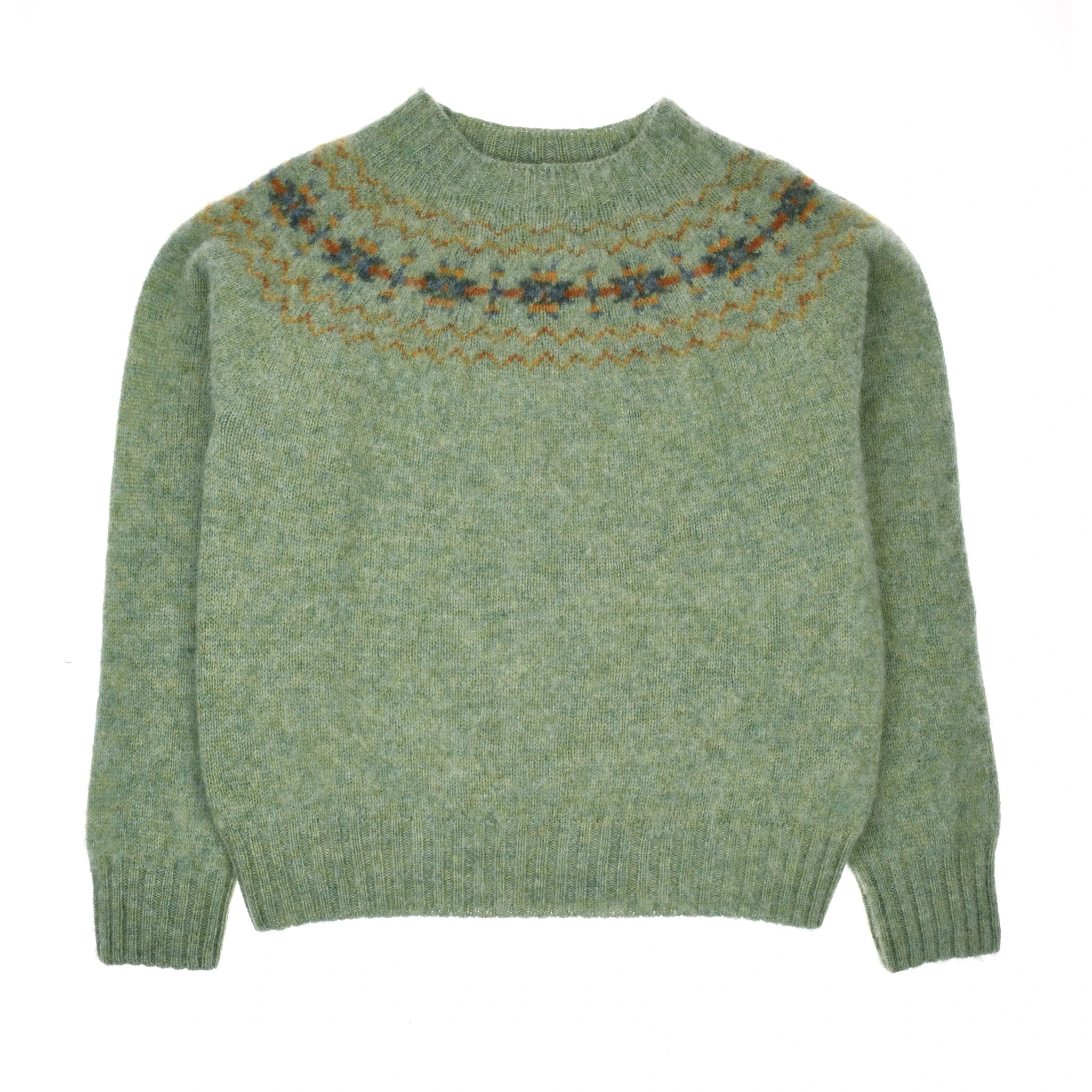 The Auld Stock Cropped Fairisle Crew Neck Jumper by Campbell’s of Beauly is an aqua Pure New Wool knit with a round neck and geometric patterned yoke in orange, blue, and brown. Features long sleeves and ribbed cuffs and hem.